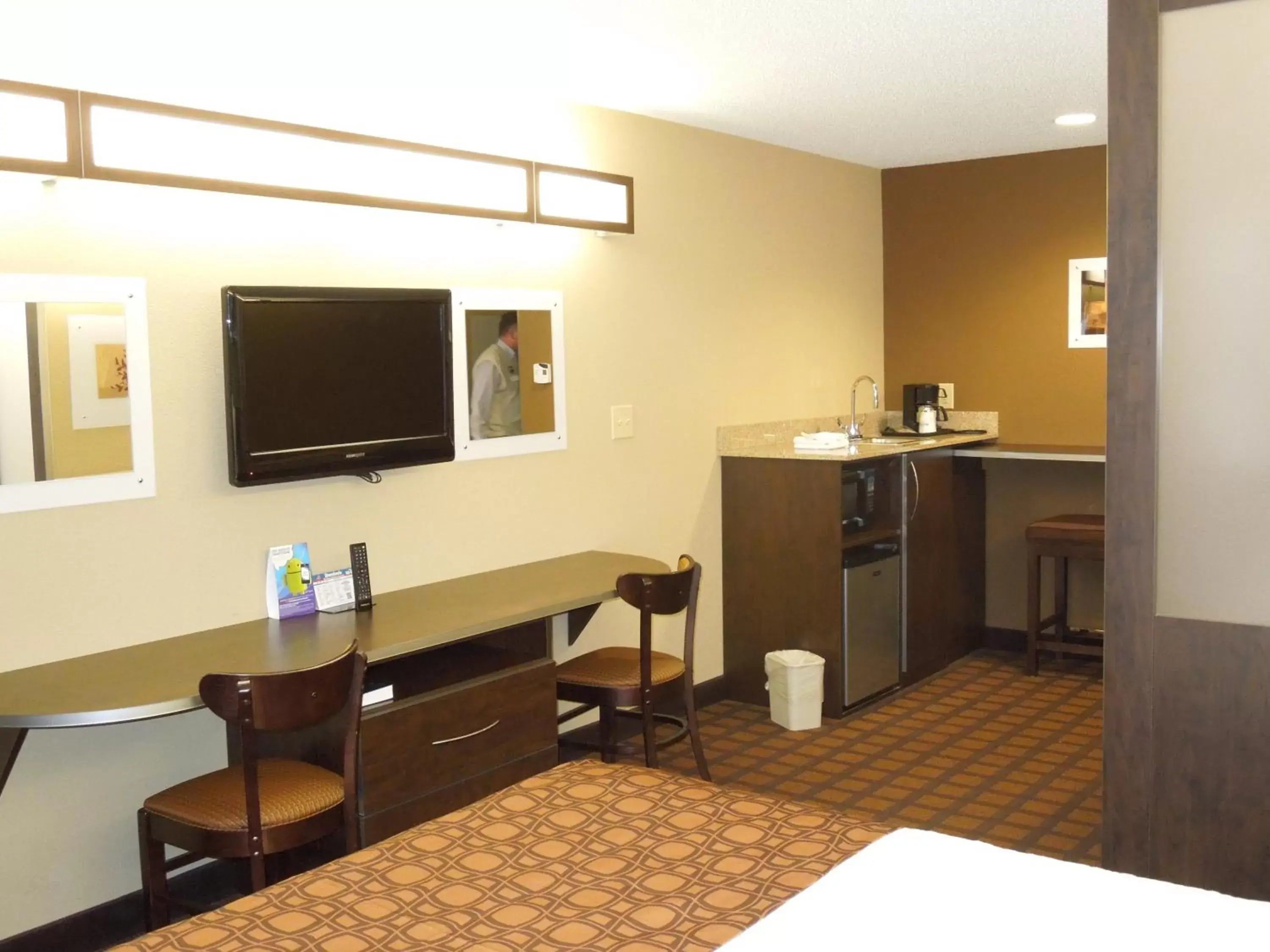 Photo of the whole room, TV/Entertainment Center in Microtel Inn & Suites by Wyndham Harrisonburg