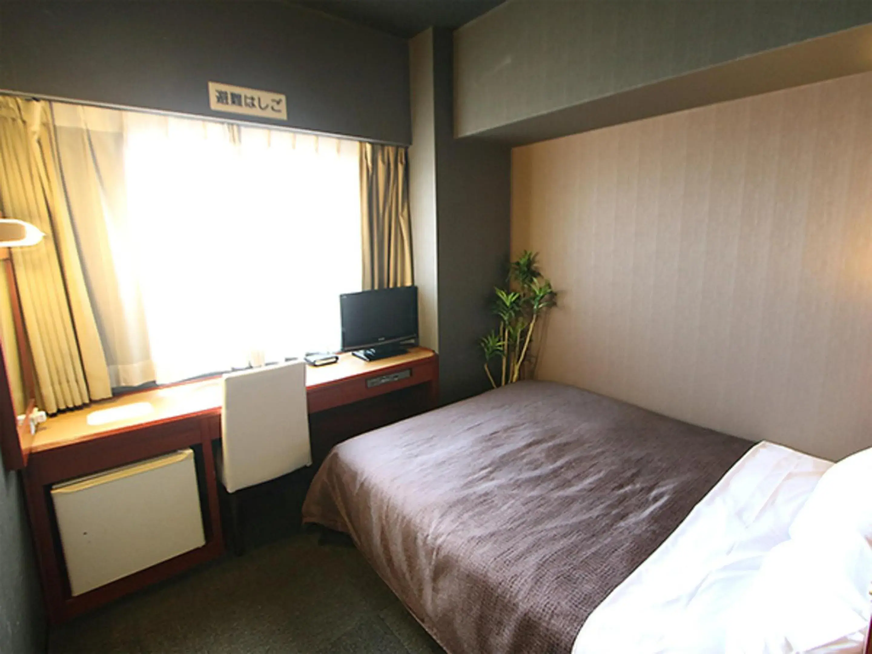 Bed in HOTEL LiVEMAX BUDGET Yokohama Tsurumi