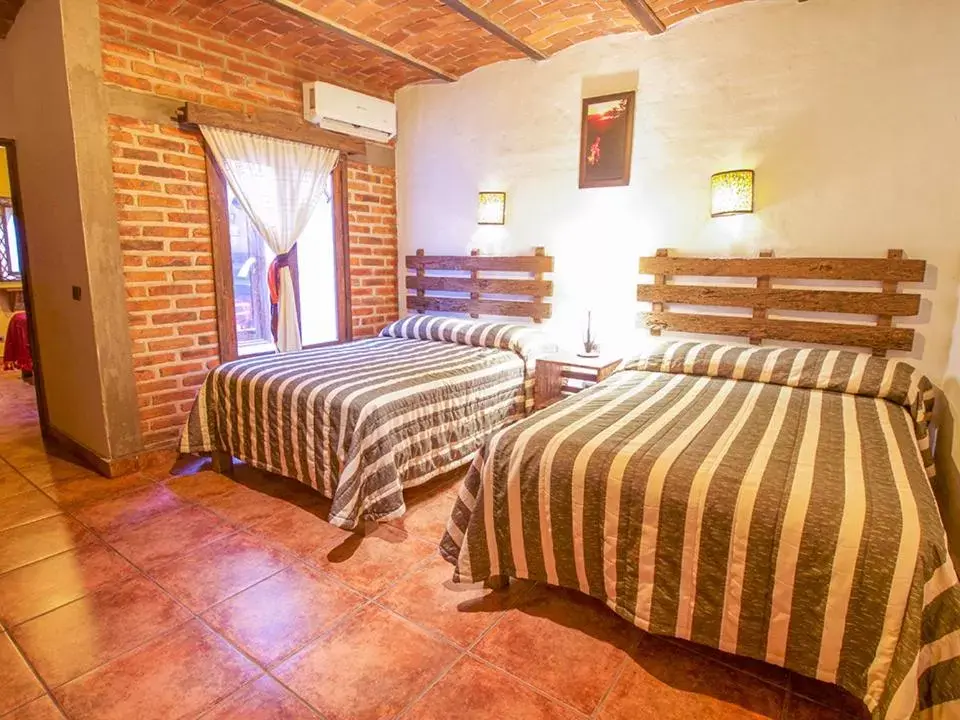Bedroom, Bed in Hotel Mi Pueblito by Rotamundos