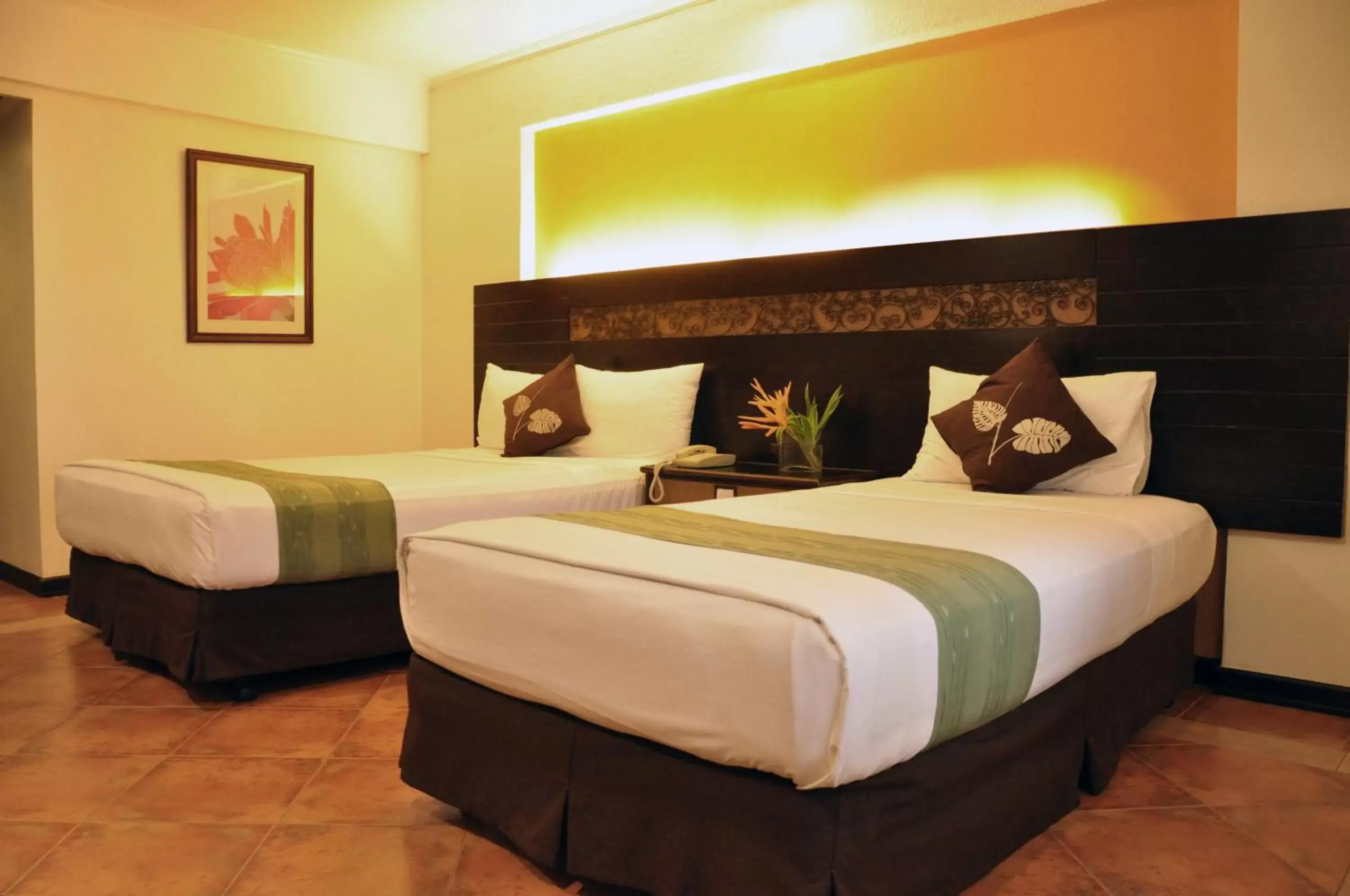 Bed in Montebello Villa Hotel