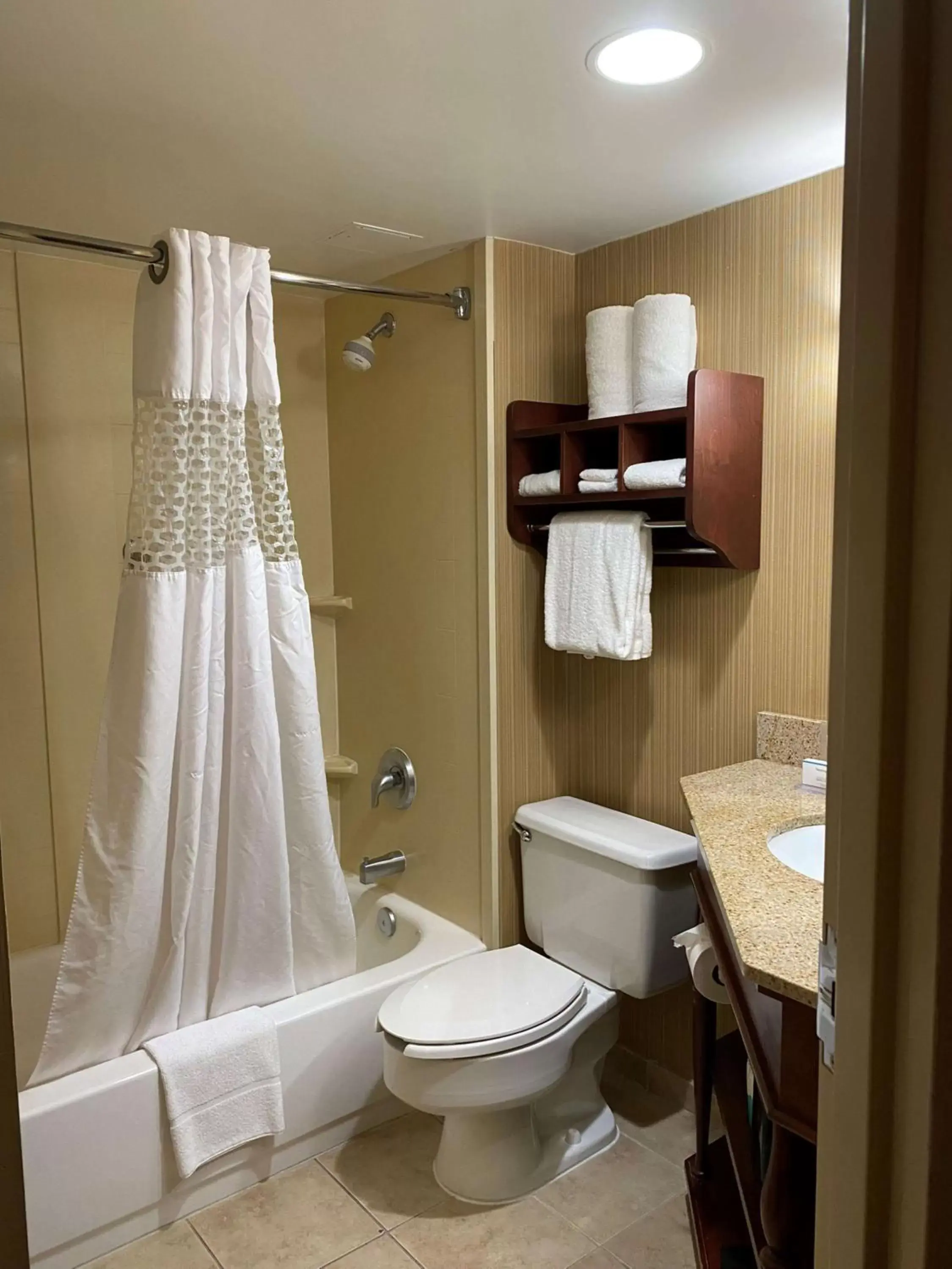 Bathroom in The Addison Hotel SureStay Collection by Best Western