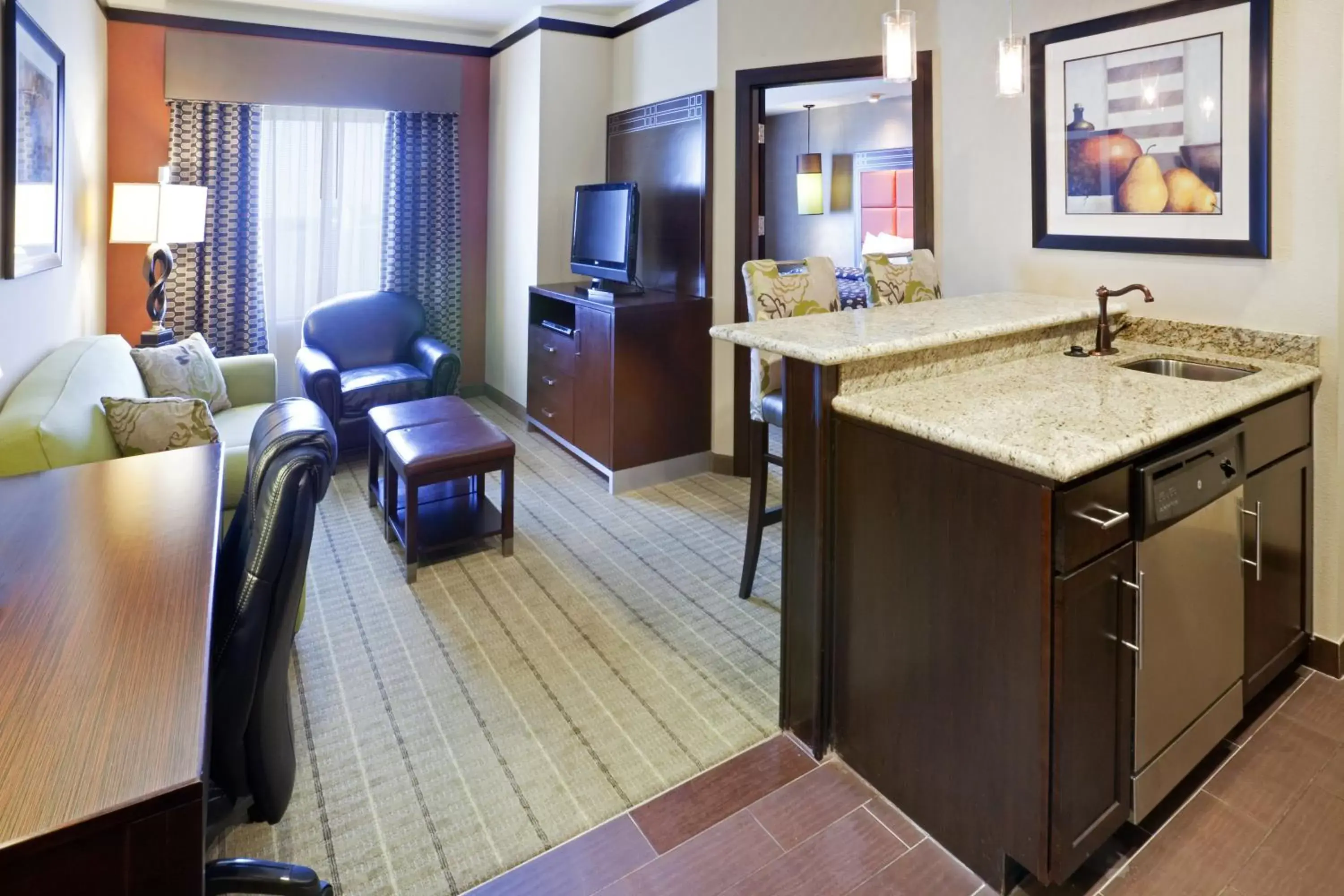 Photo of the whole room, Kitchen/Kitchenette in Staybridge Suites DFW Airport North, an IHG Hotel