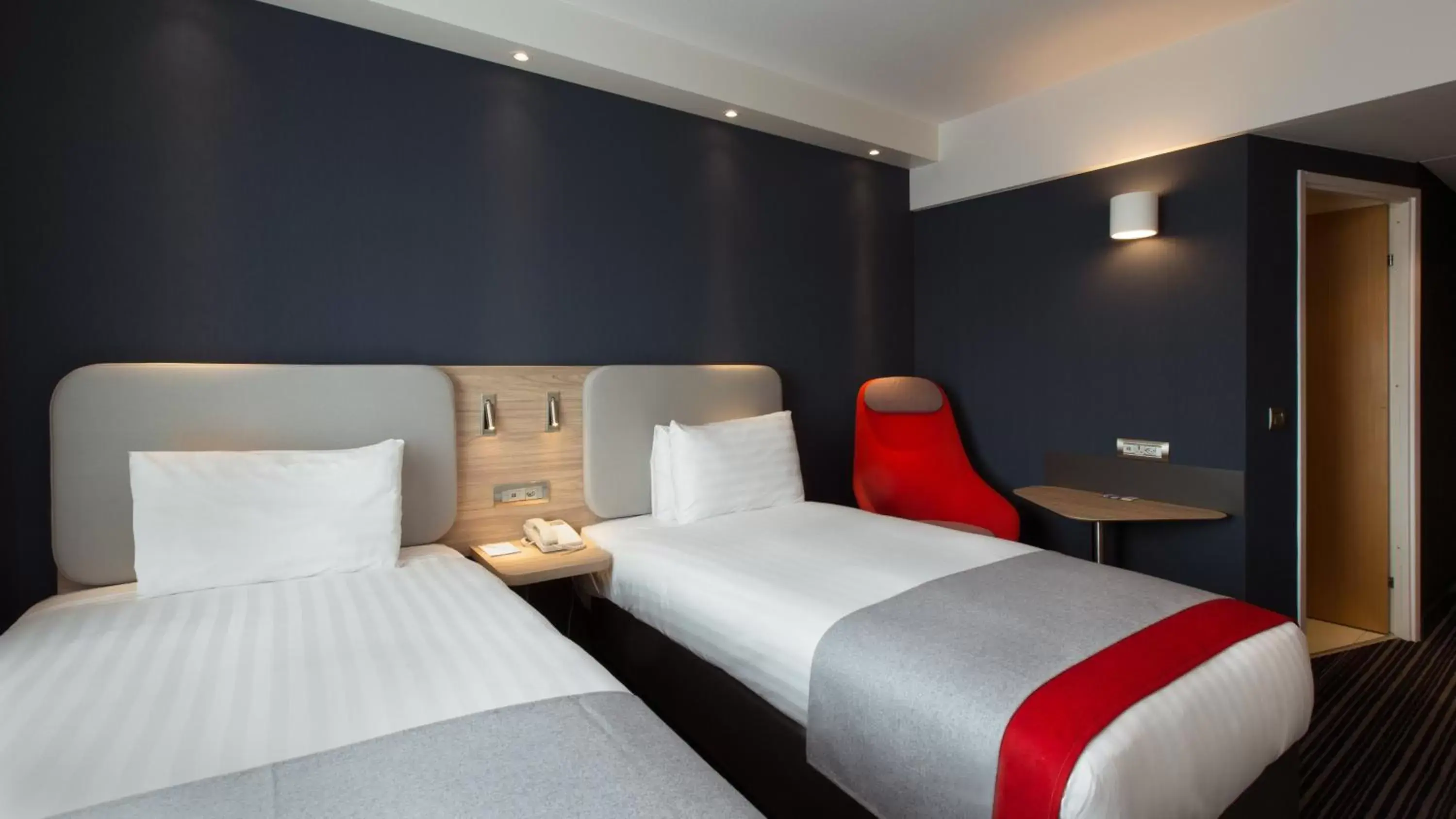 Photo of the whole room, Bed in Holiday Inn Express Geneva Airport