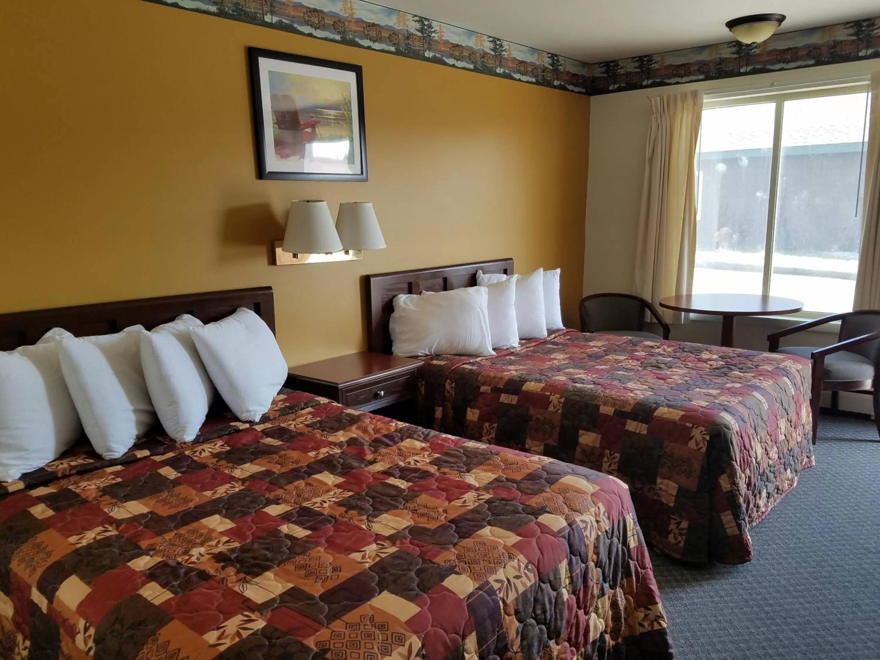 Bed in Clark's Beach Motel