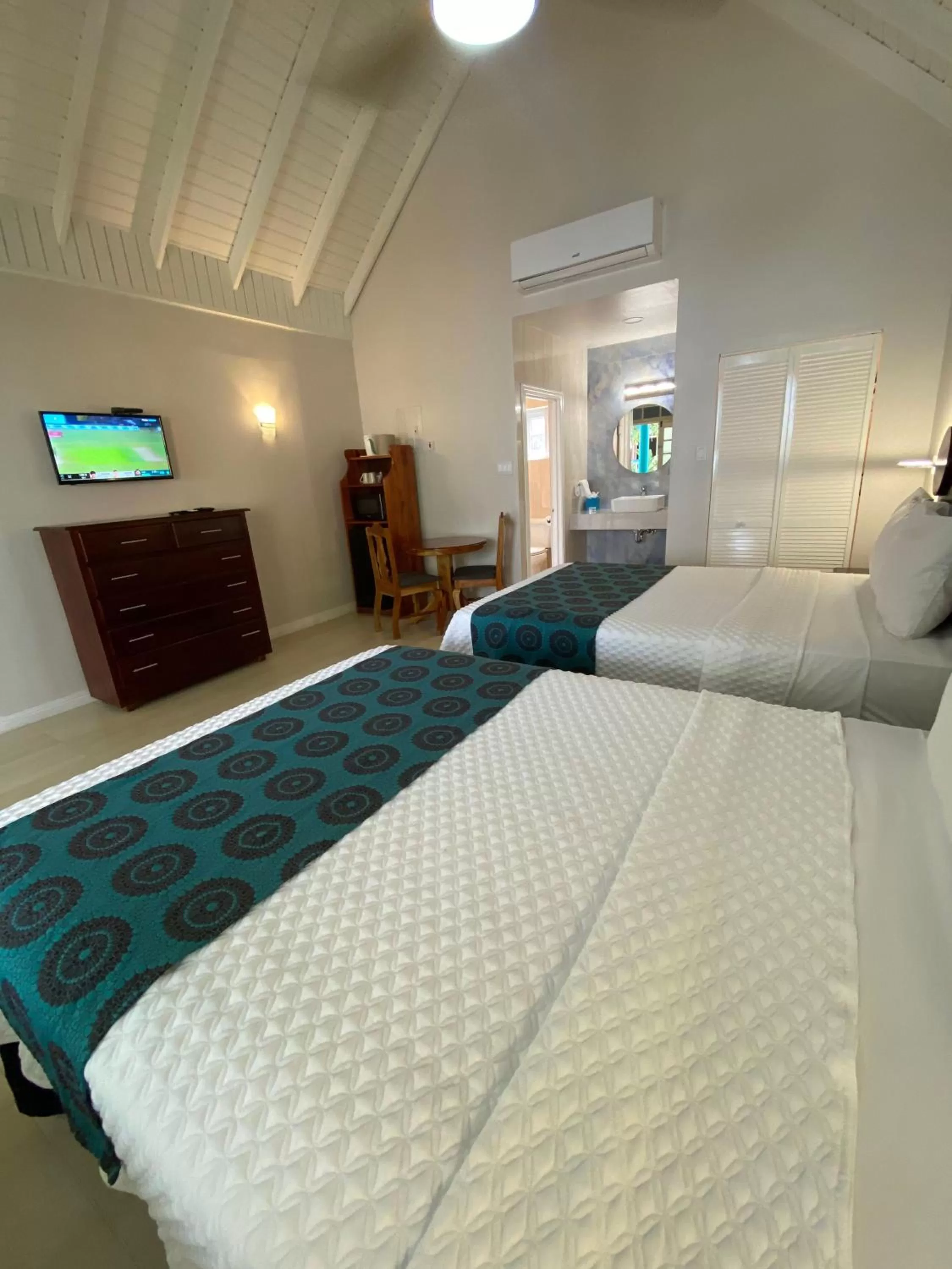 Bed in THE BOARDWALK VILLAGE