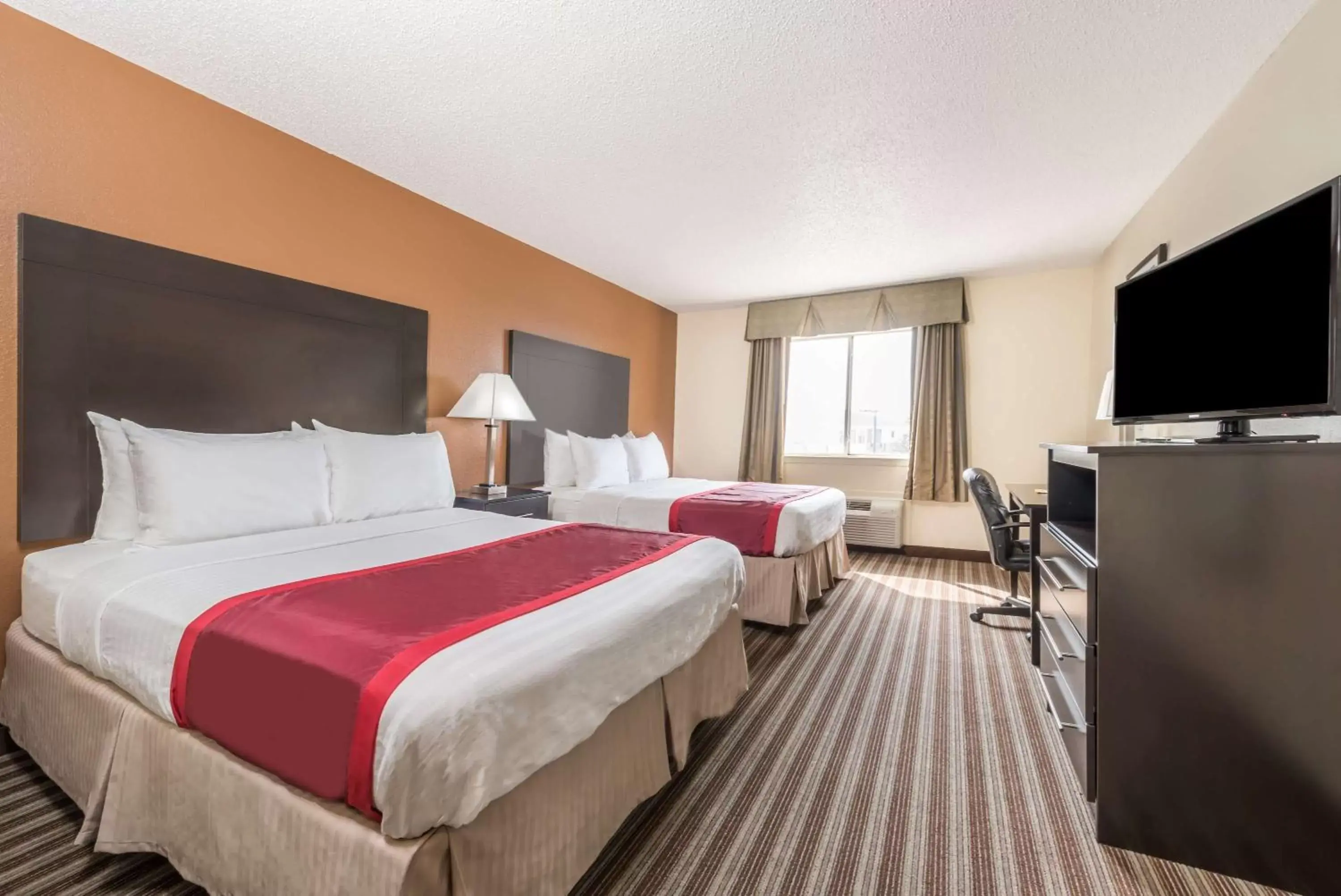 Queen Room with Two Queen Beds and Bath Tub - Mobility/Hearing Accessible - Non-Smoking in Days Inn & Suites by Wyndham Dallas