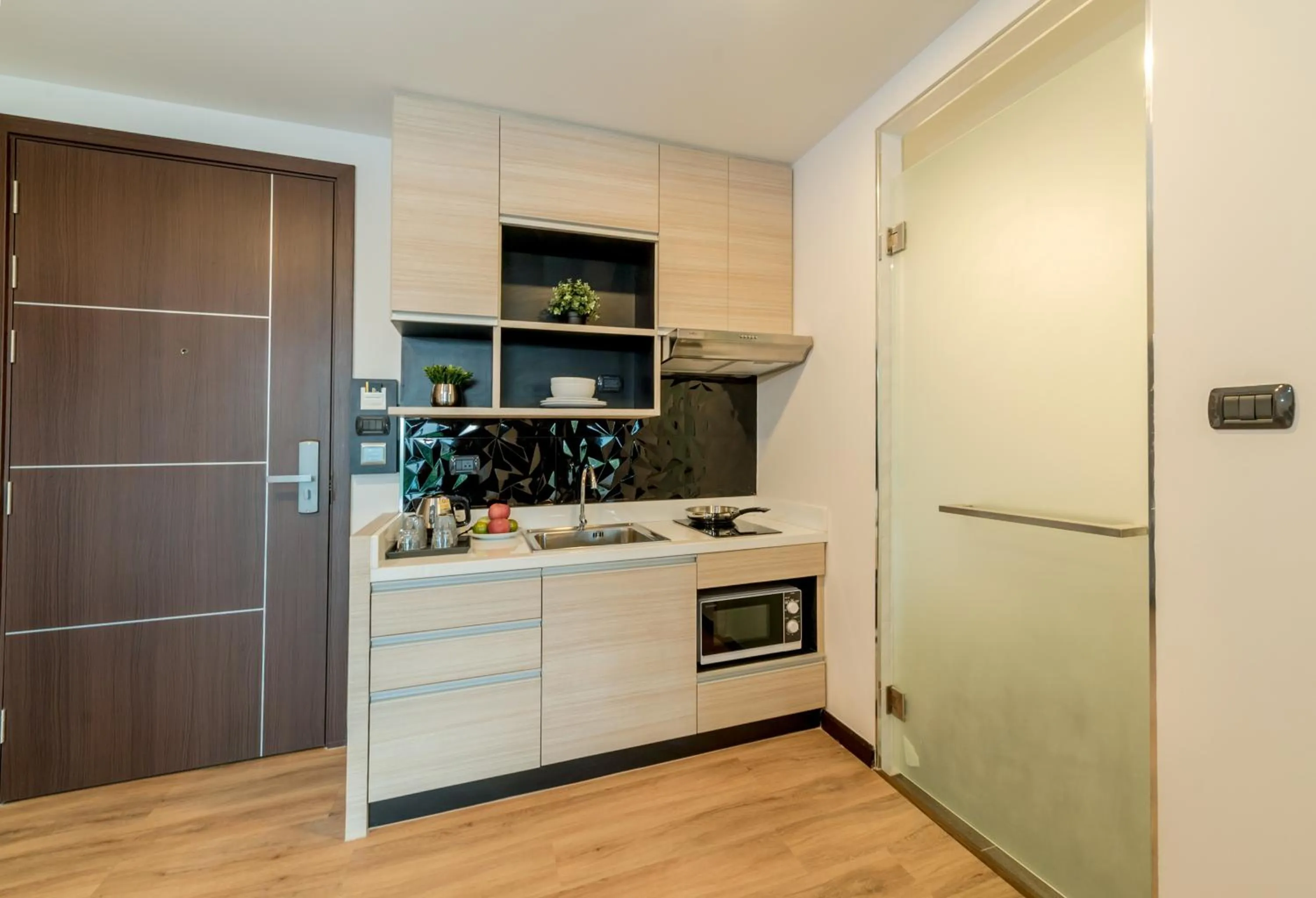 Kitchen or kitchenette in Pause and Play Hotel