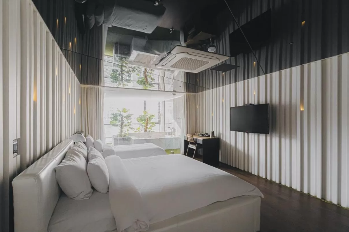 Bed in ACC Design Hotel