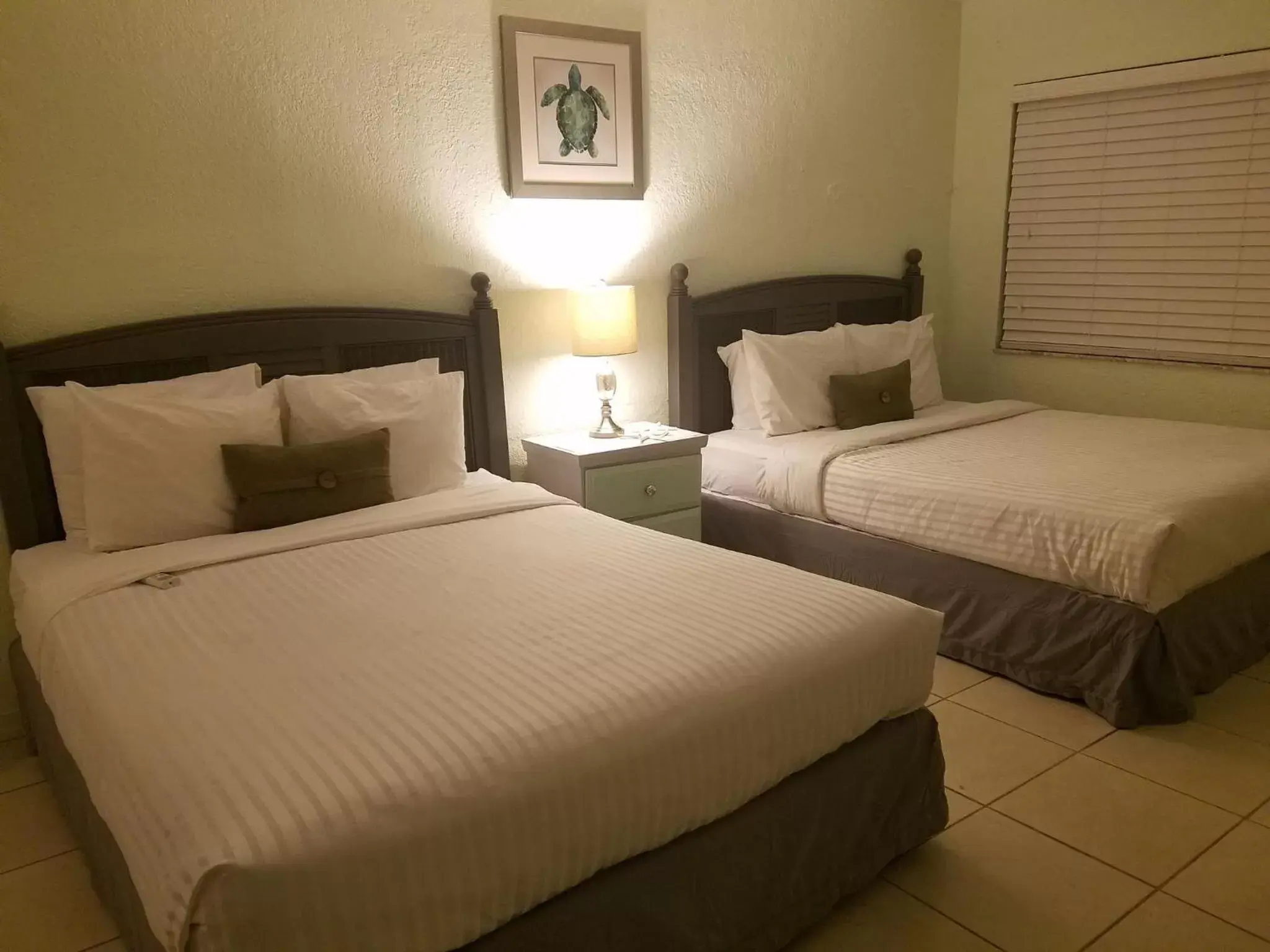 Bed in Blind Pass Resort Motel