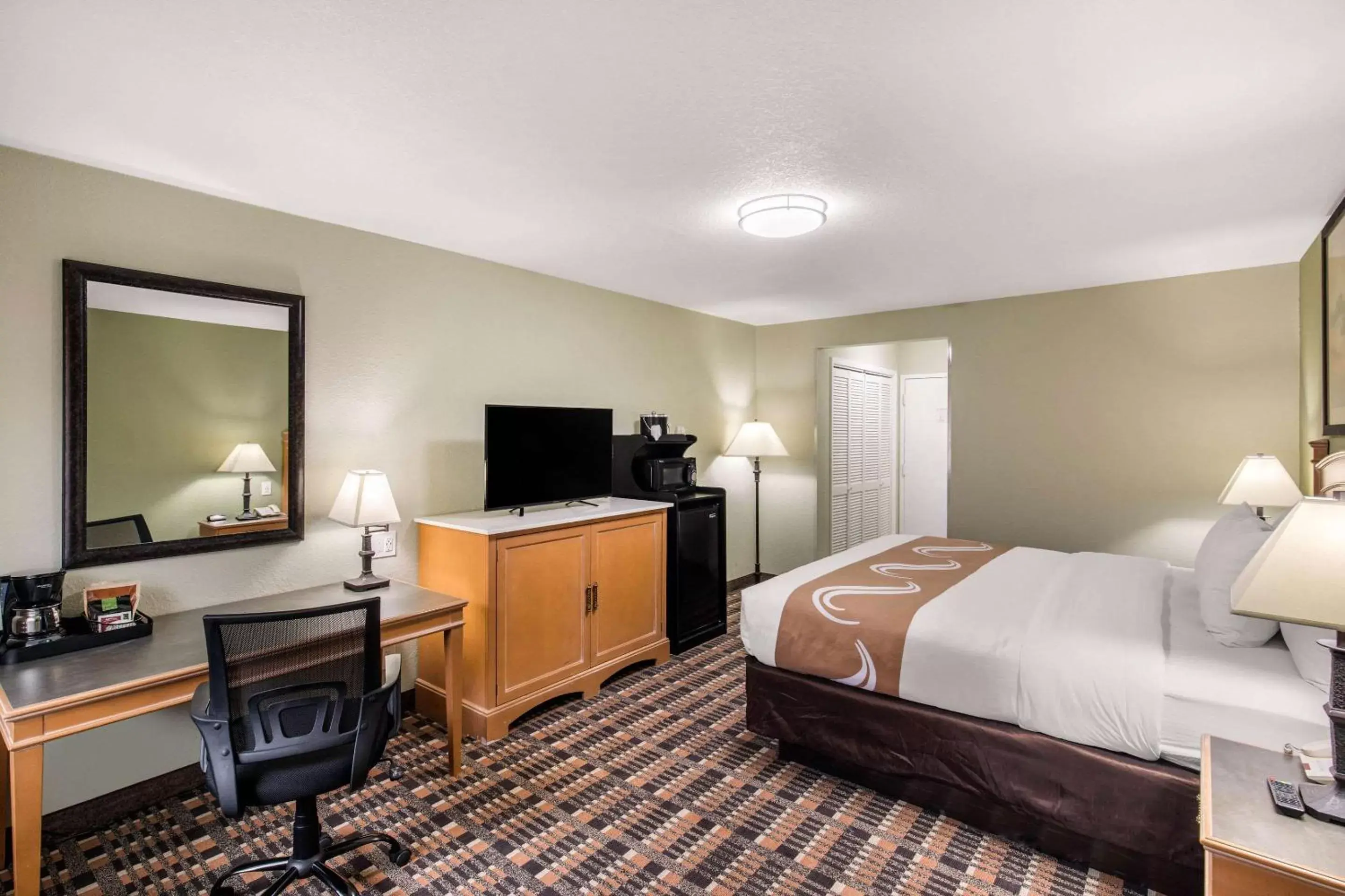 Photo of the whole room, TV/Entertainment Center in Quality Inn & Suites Plano