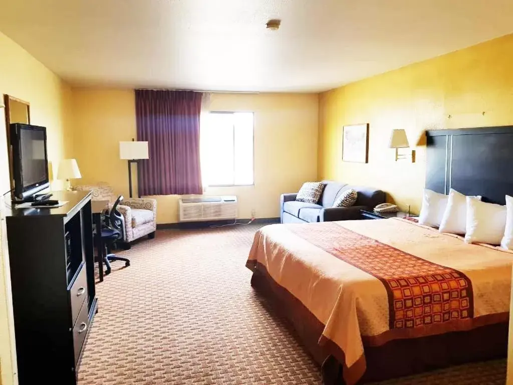 Bed in Rodeway Inn & Suites Bed in Rodeway Inn & Suites