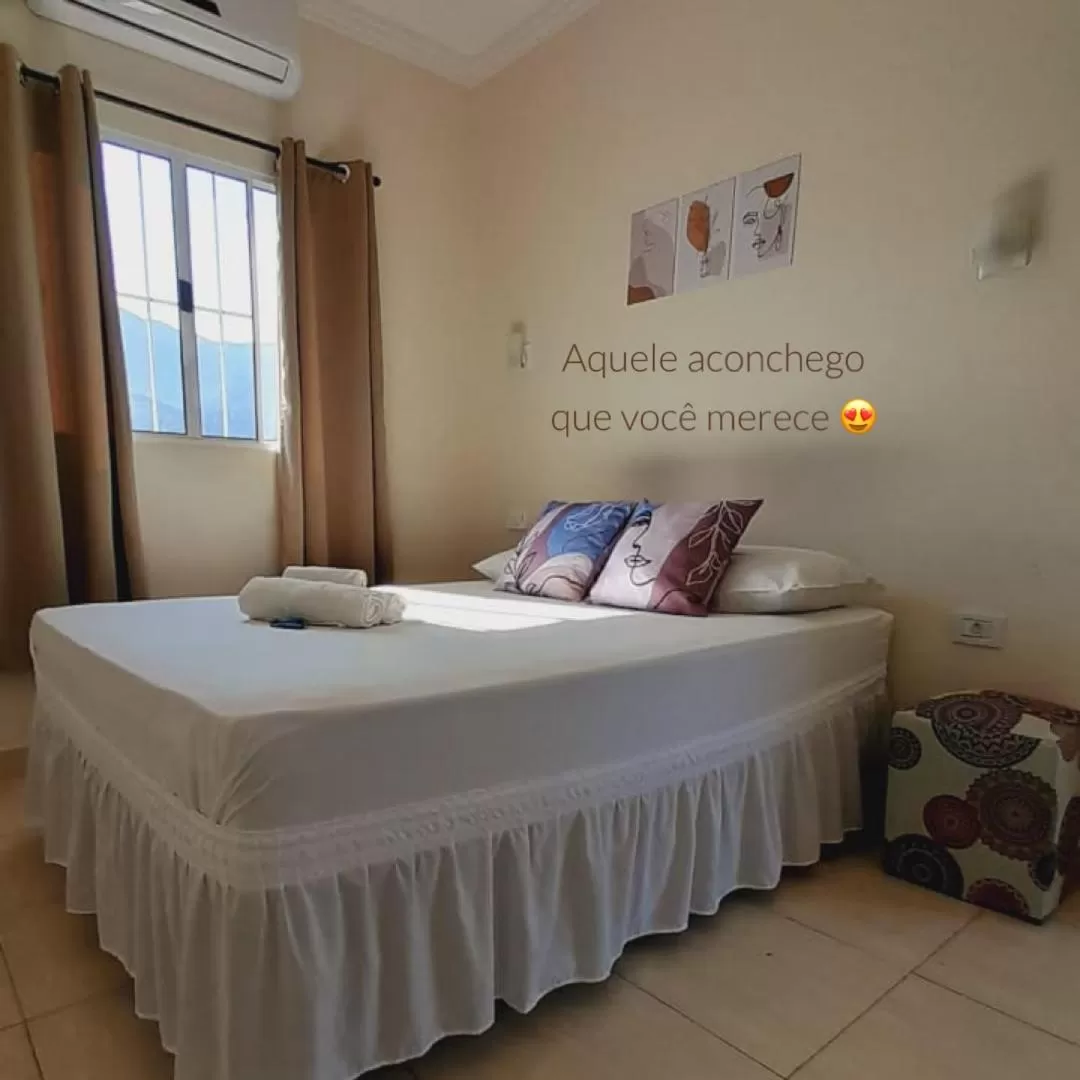 Bed in Pousada Recanto Som do Mar