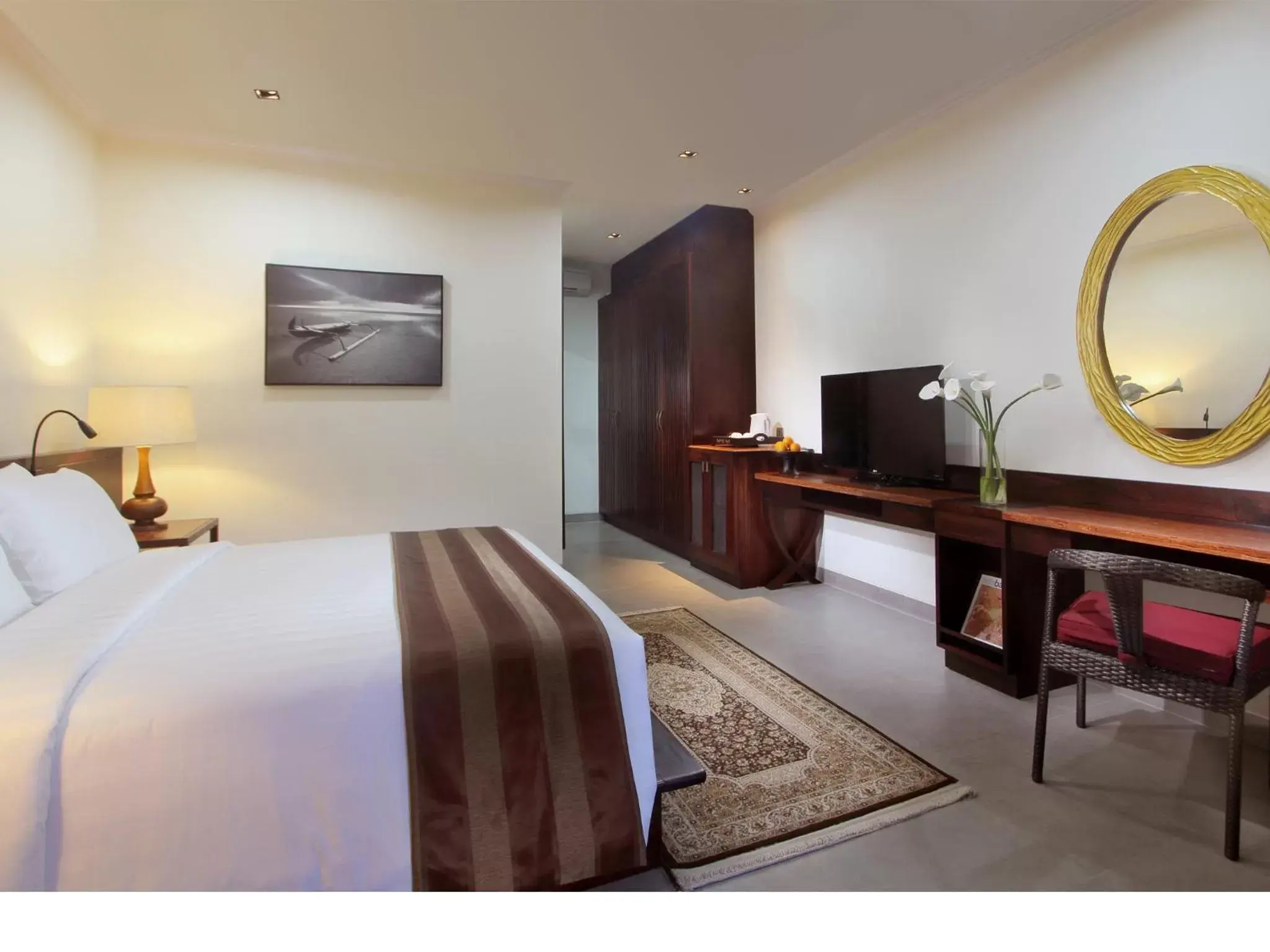 Bedroom, TV/Entertainment Center in Griya Santrian a Beach Resort