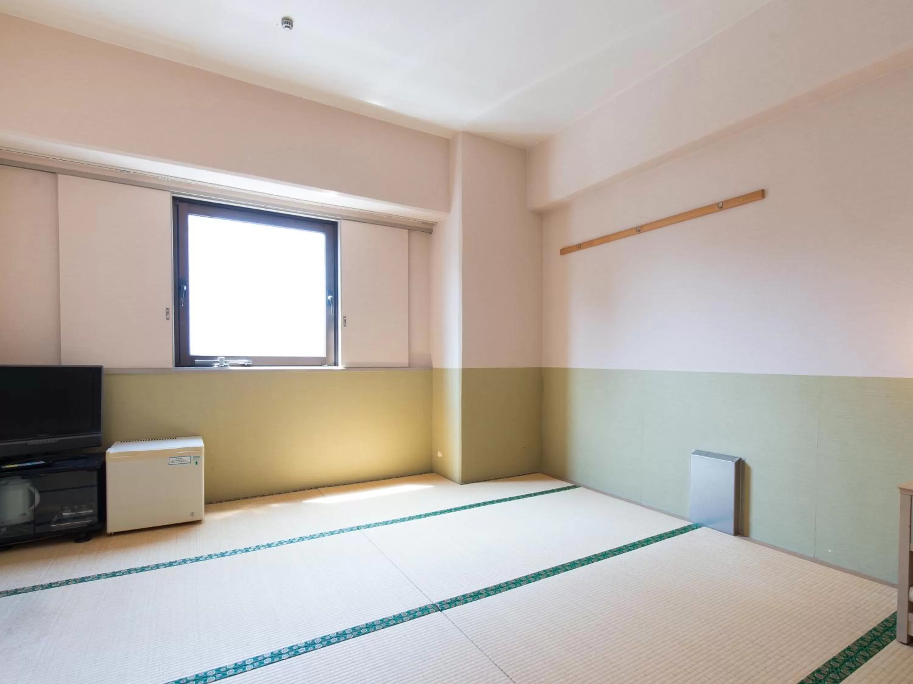 Photo of the whole room, Bed in Tabist Hotel Tetora Kitakyushu