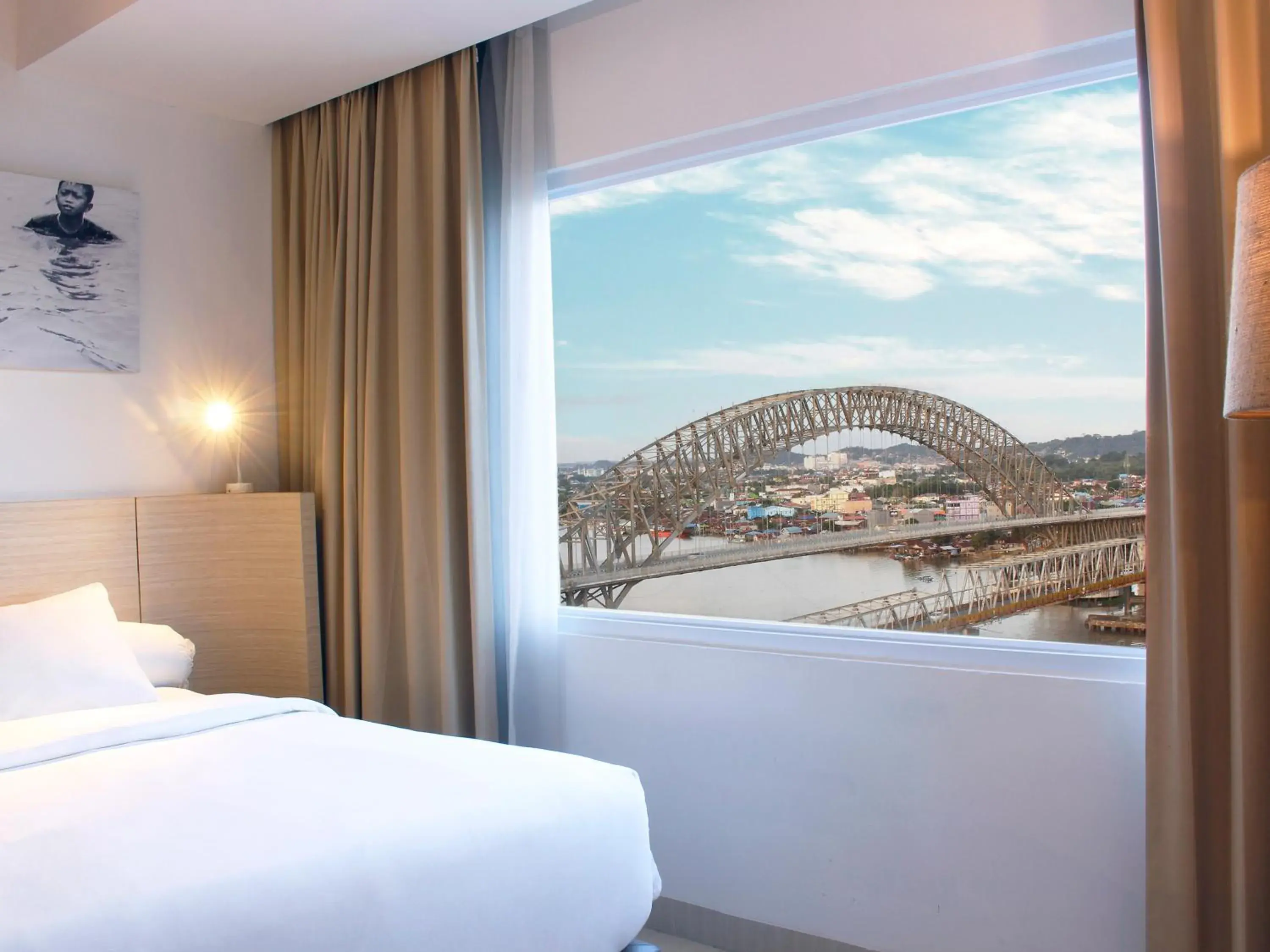 View (from property/room), Bed in HARRIS Hotel Samarinda View (from property/room), Bed in HARRIS Hotel Samarinda
