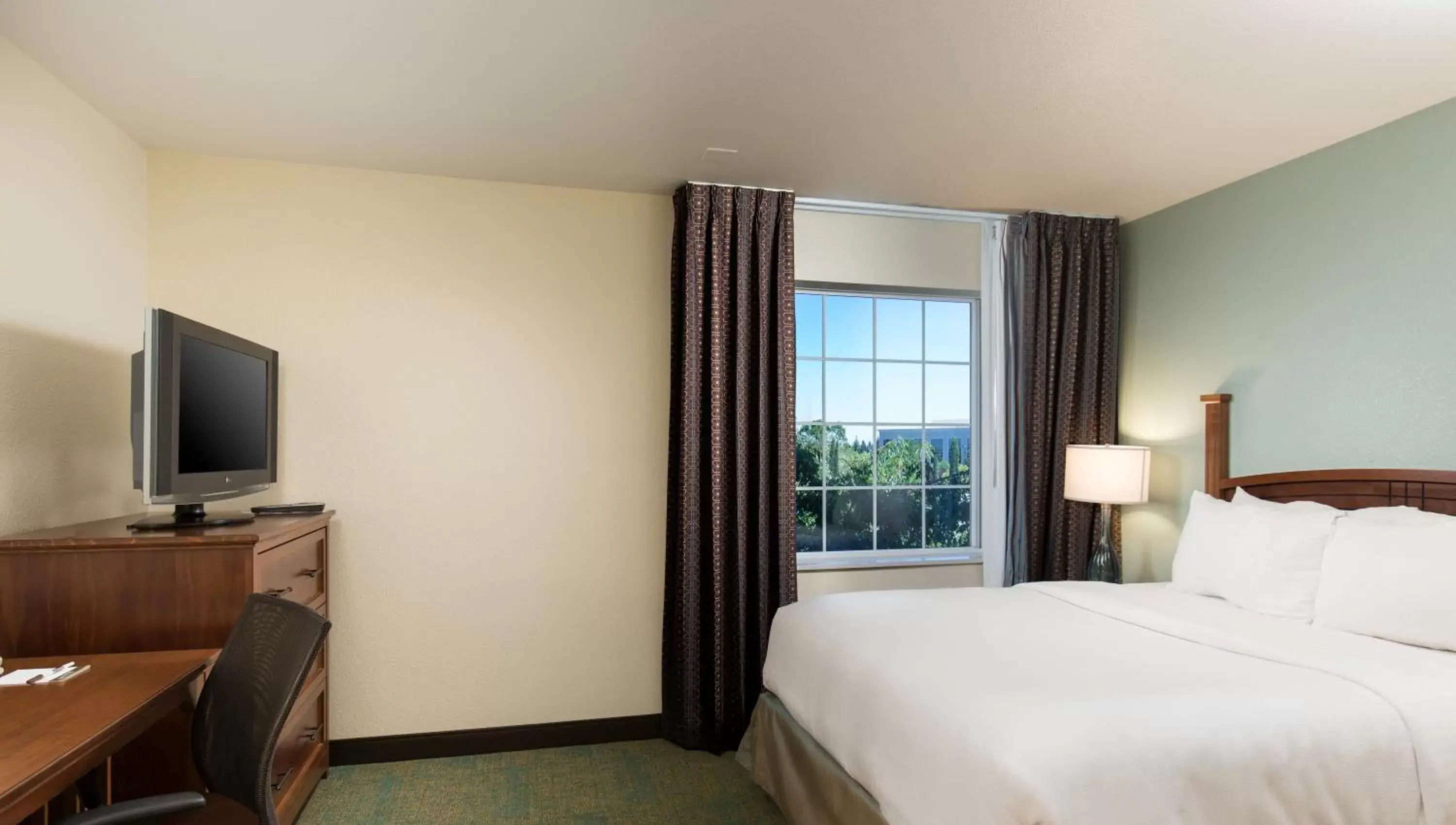 Bed in Staybridge Suites Sacramento-Folsom, an IHG Hotel