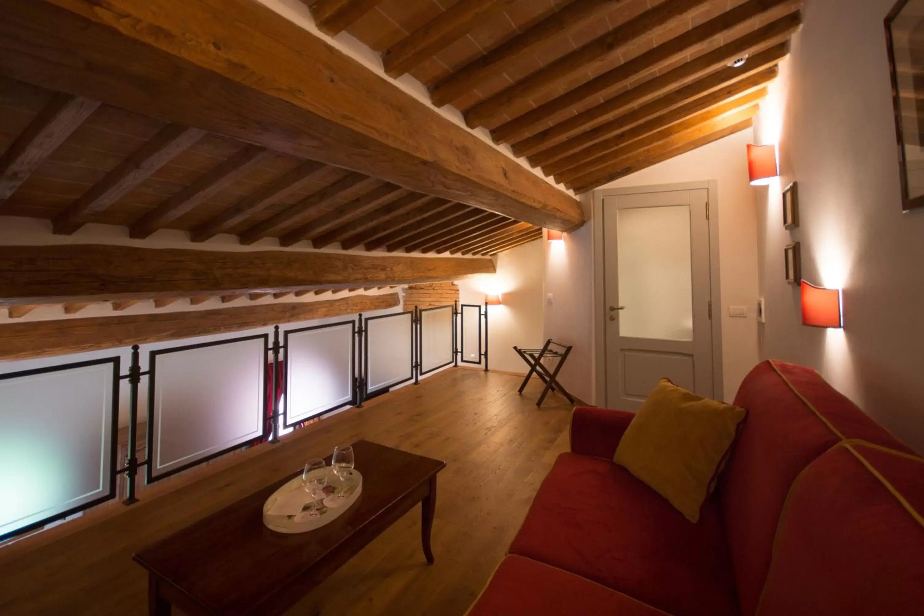 Bed, Seating Area in Palazzo Pacini