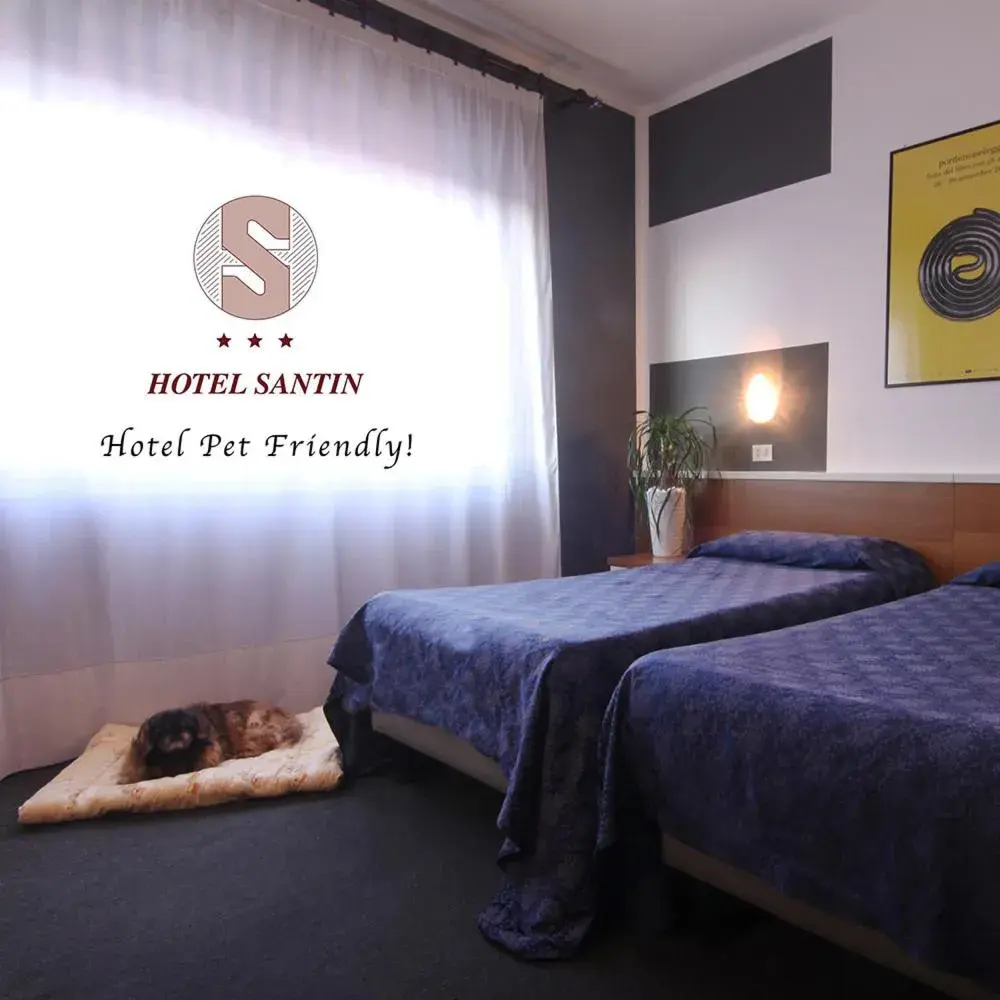 Bed in Hotel Santin