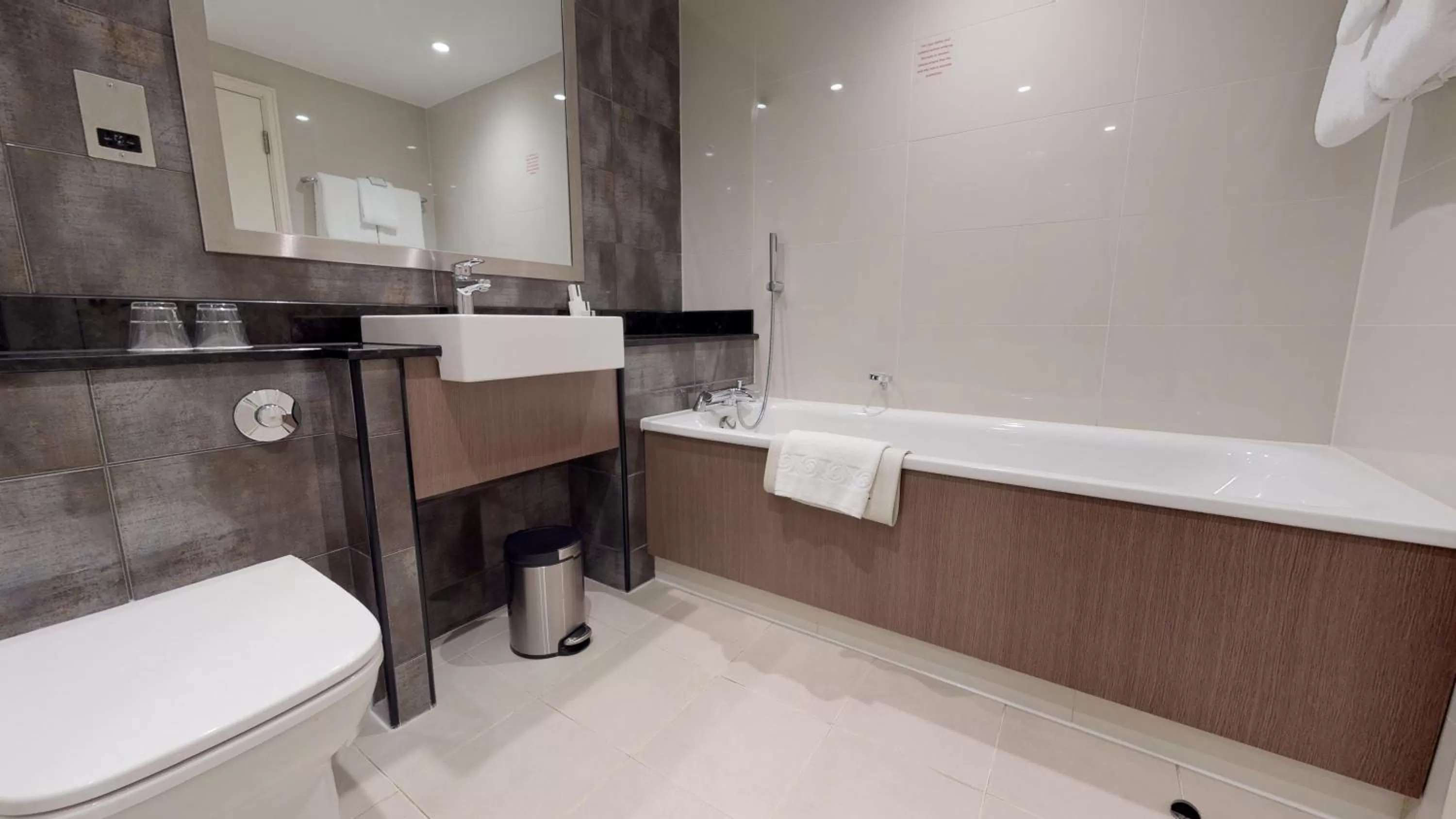Bathroom in Holiday Inn London Kensington High St. by IHG