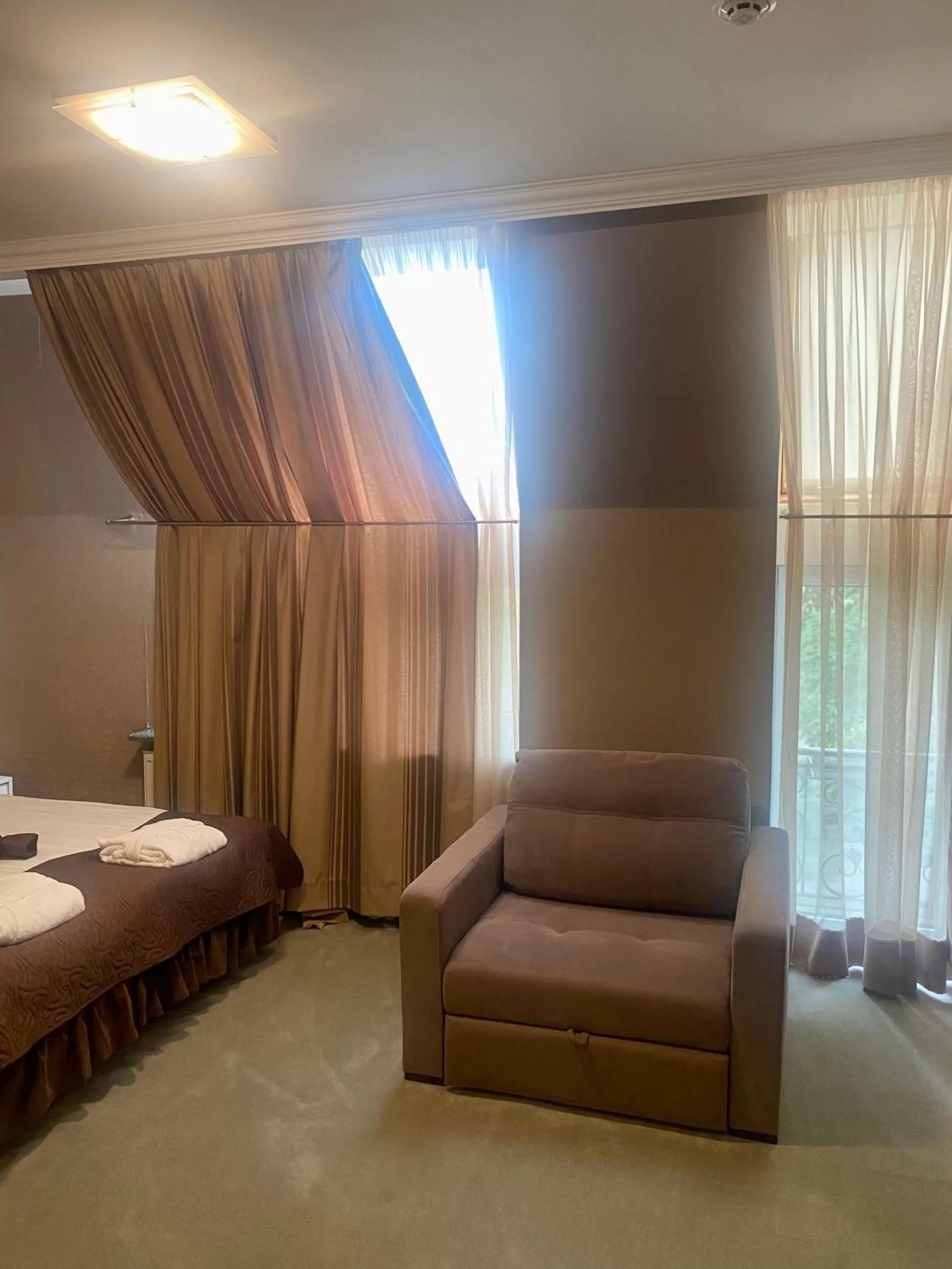 Photo of the whole room, Bed in Boutique Hotel Deluxe