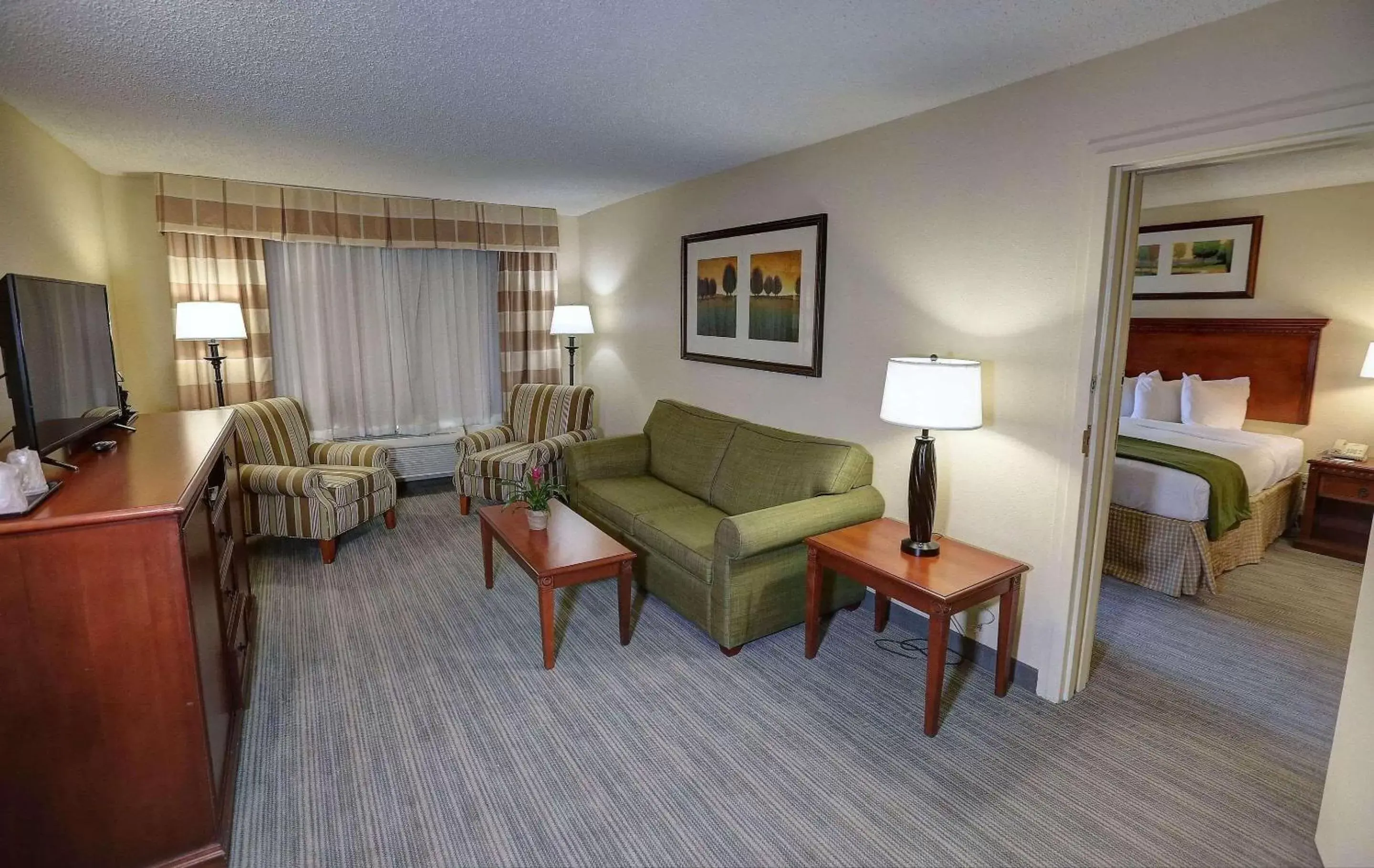 Bedroom, Seating Area in Country Inn & Suites by Radisson, Charlotte I-85 Airport, NC