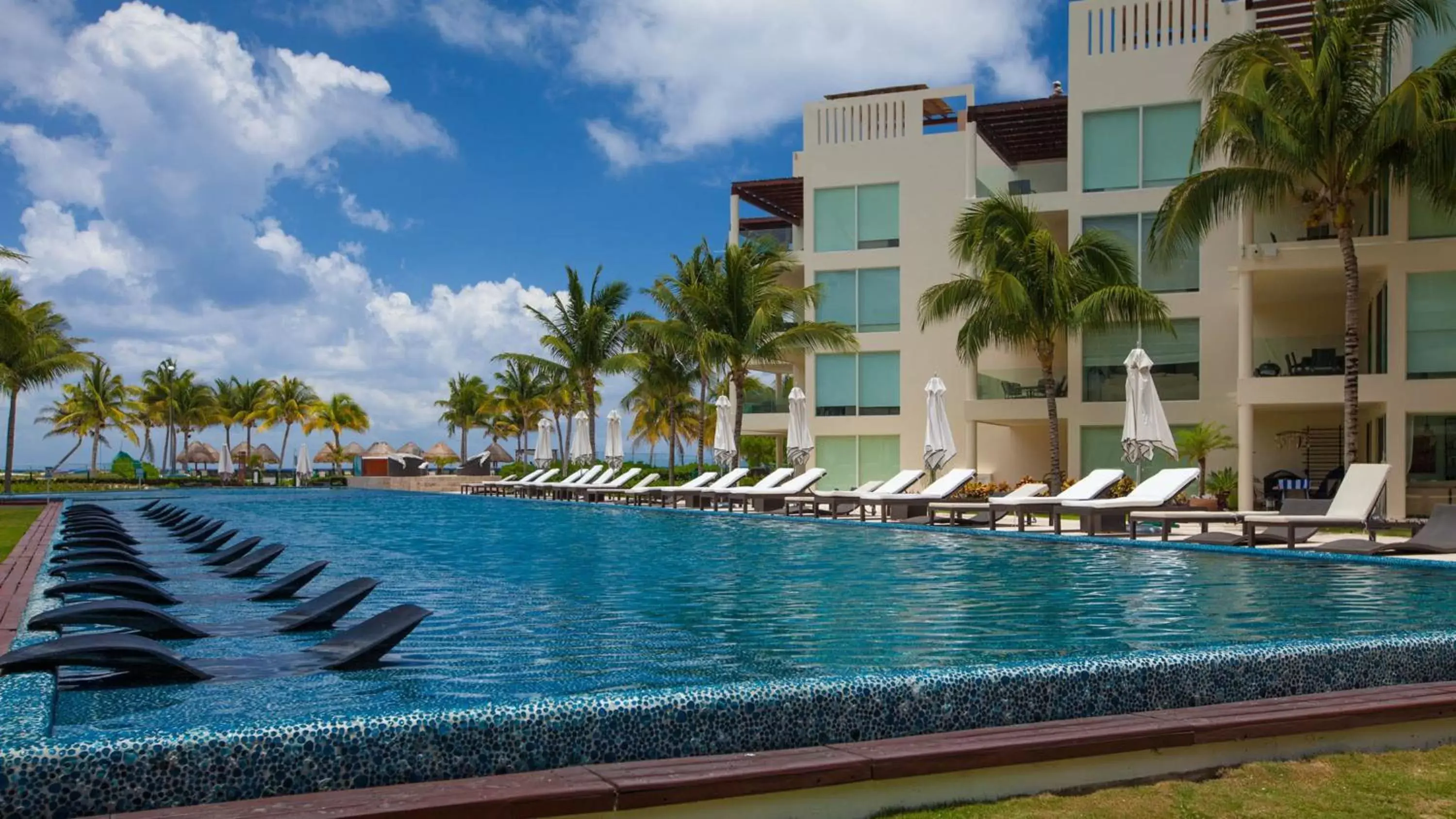 Swimming Pool in The Elements Oceanfront & Beachside Condo Hotel