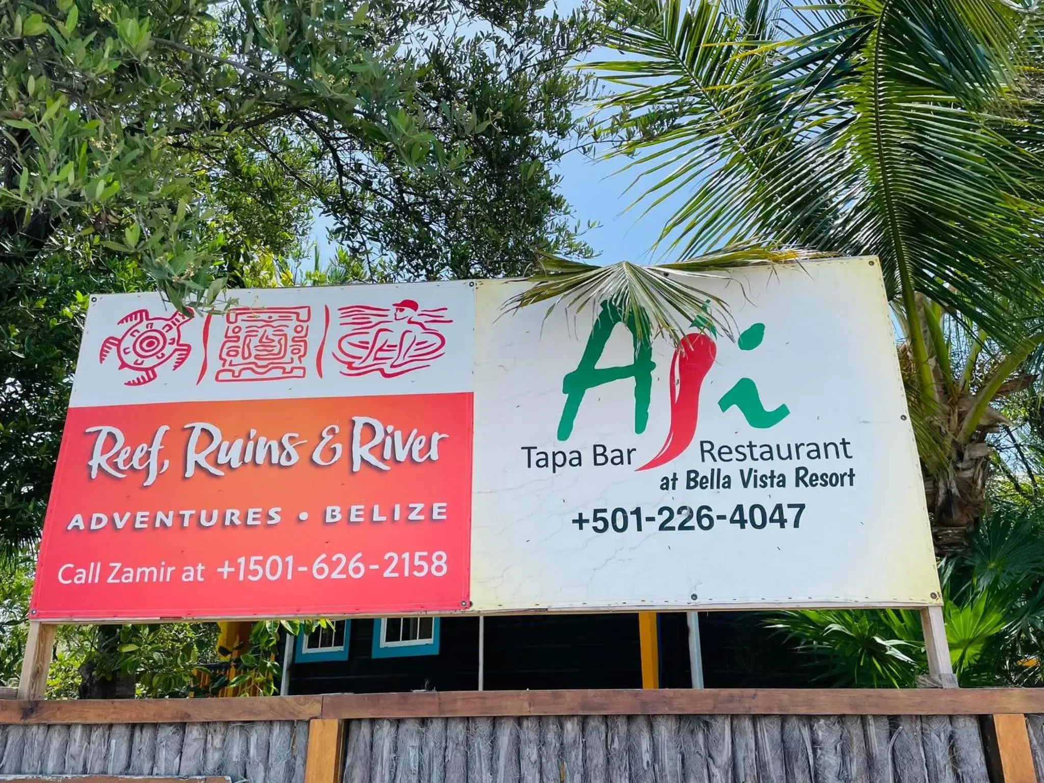 Property logo or sign in Bella Vista Resort Belize