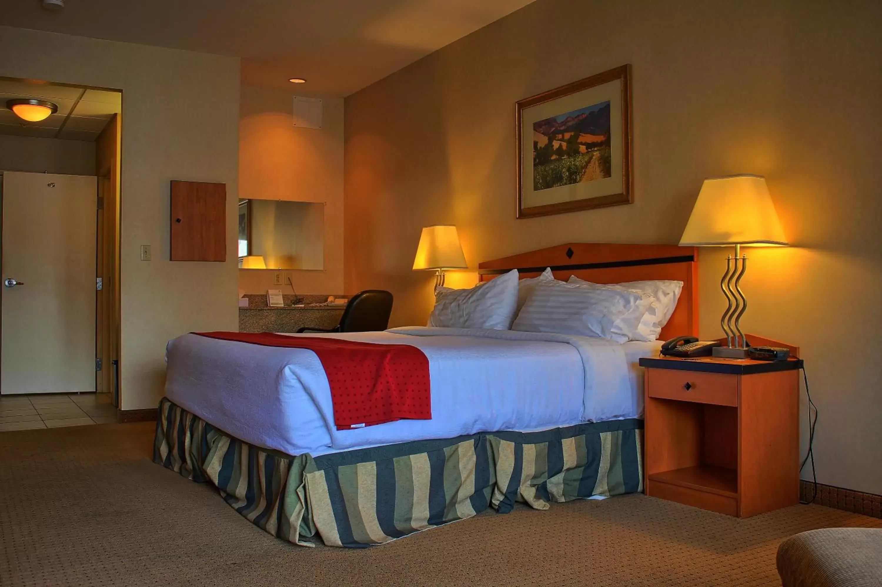 Bed in Holiday Inn Hotel & Suites Osoyoos, an IHG Hotel