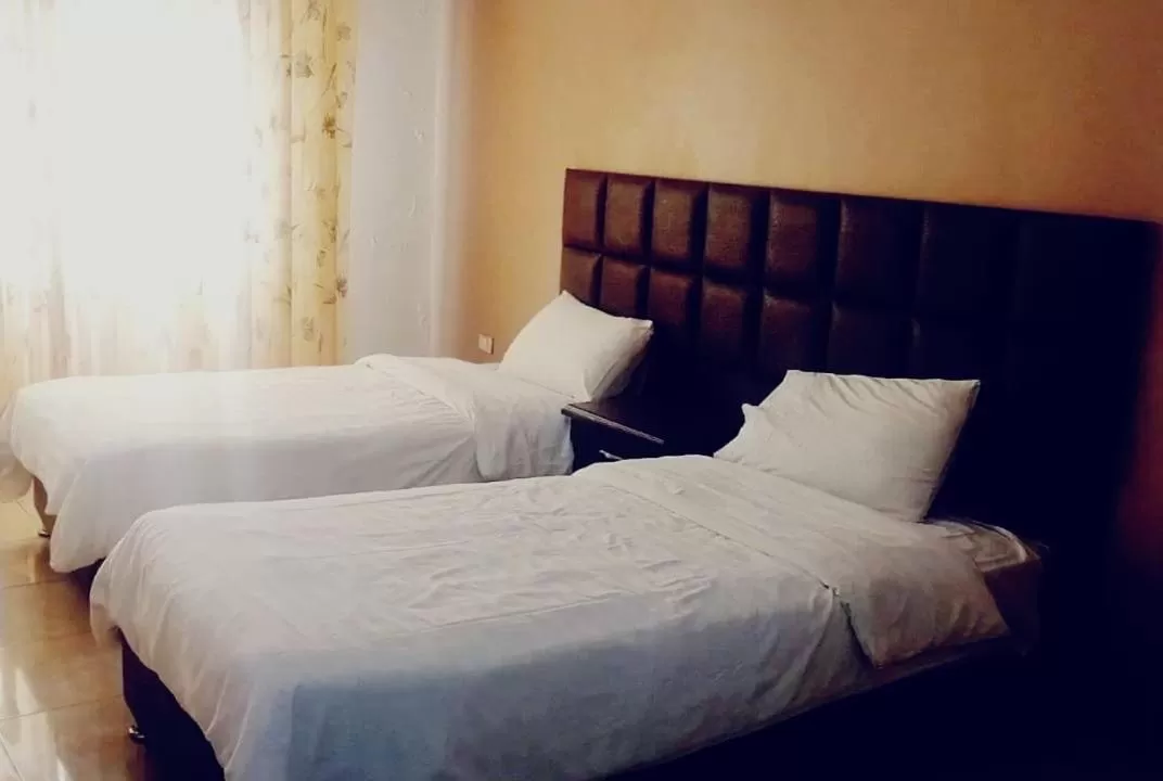 Bed in Al haramain Furnished Apartments
