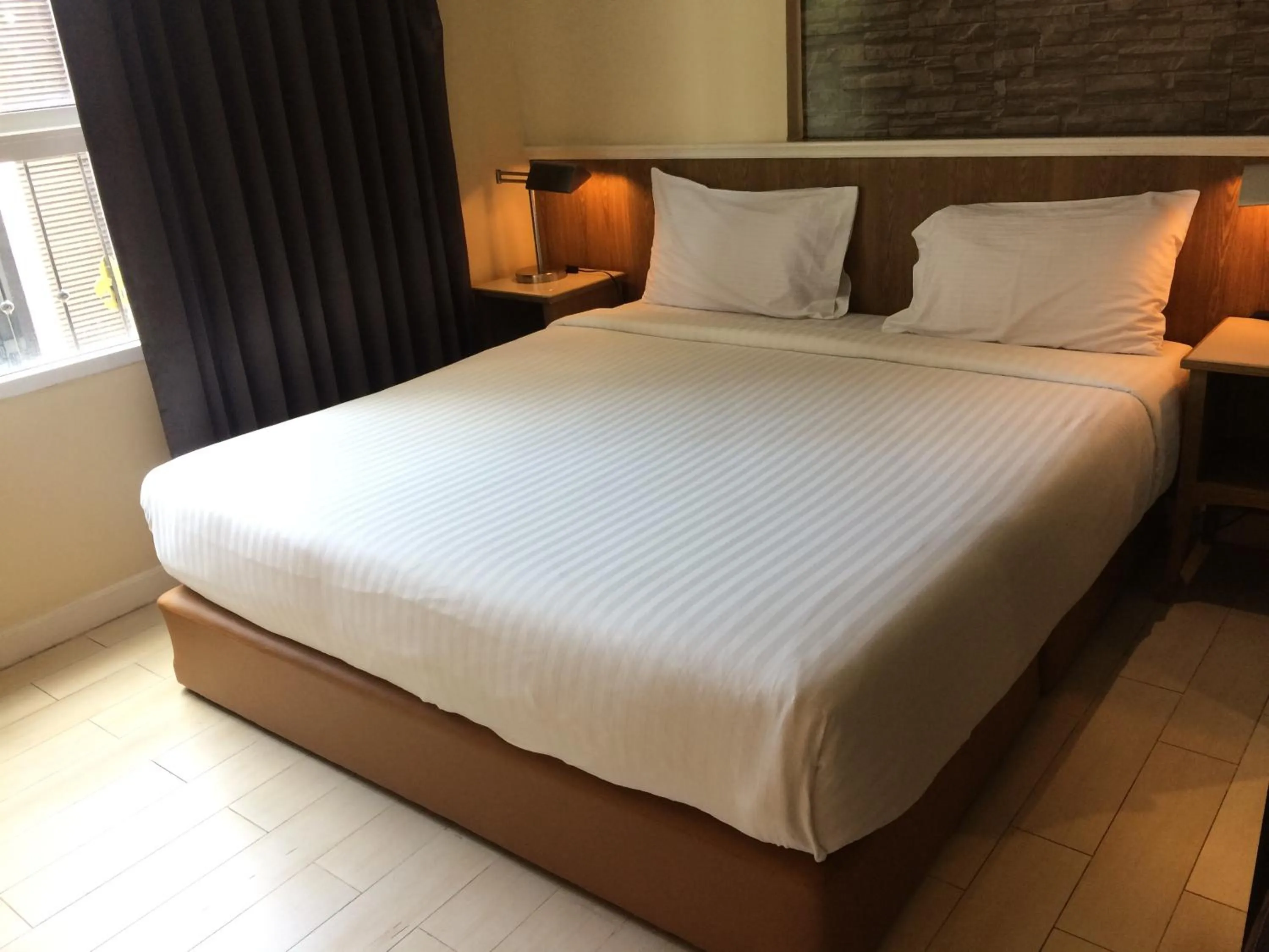 Bed in Bourbon St. Boutique Hotel