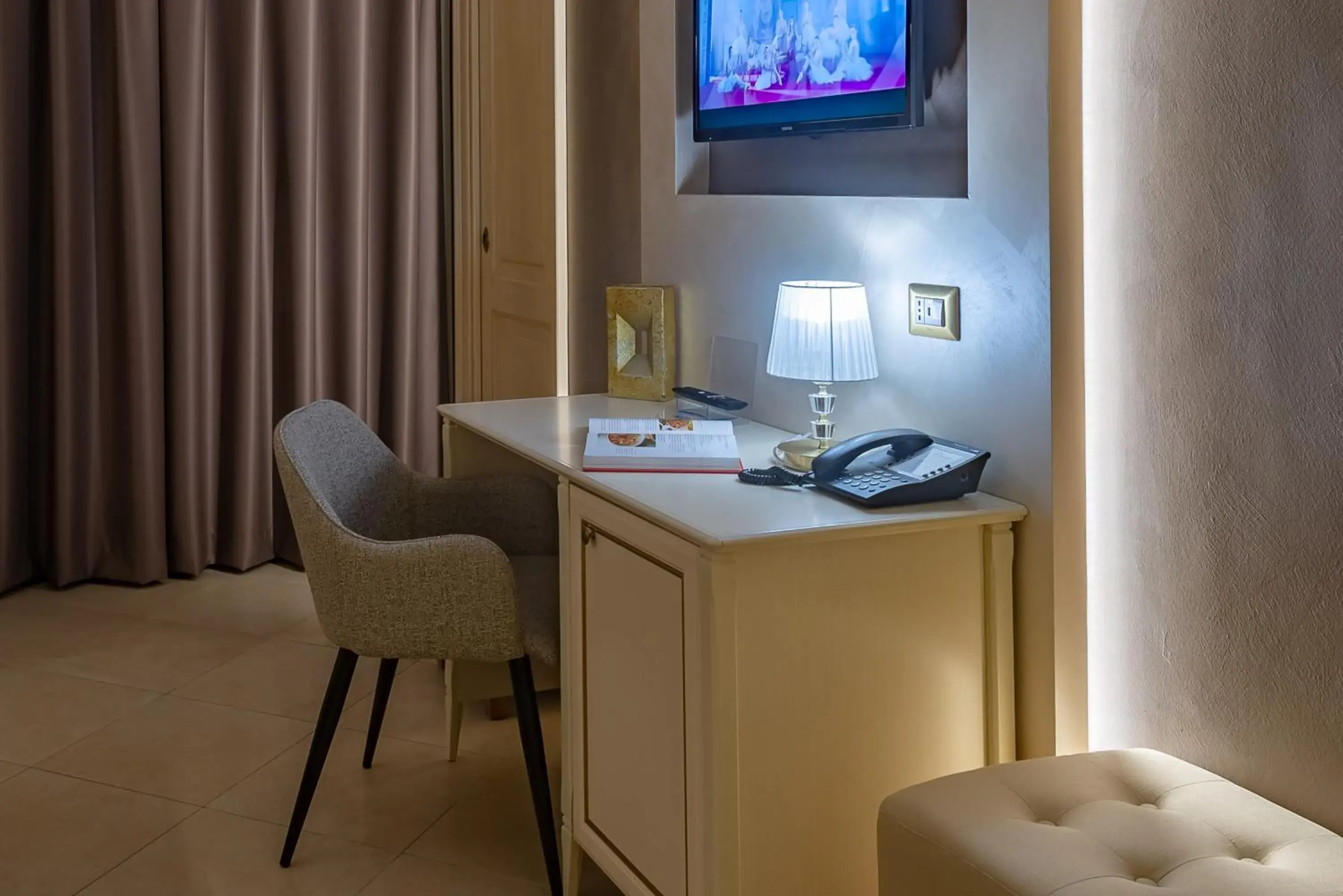 TV/Entertainment Center in Vittorio Emanuele Boutique Hotel