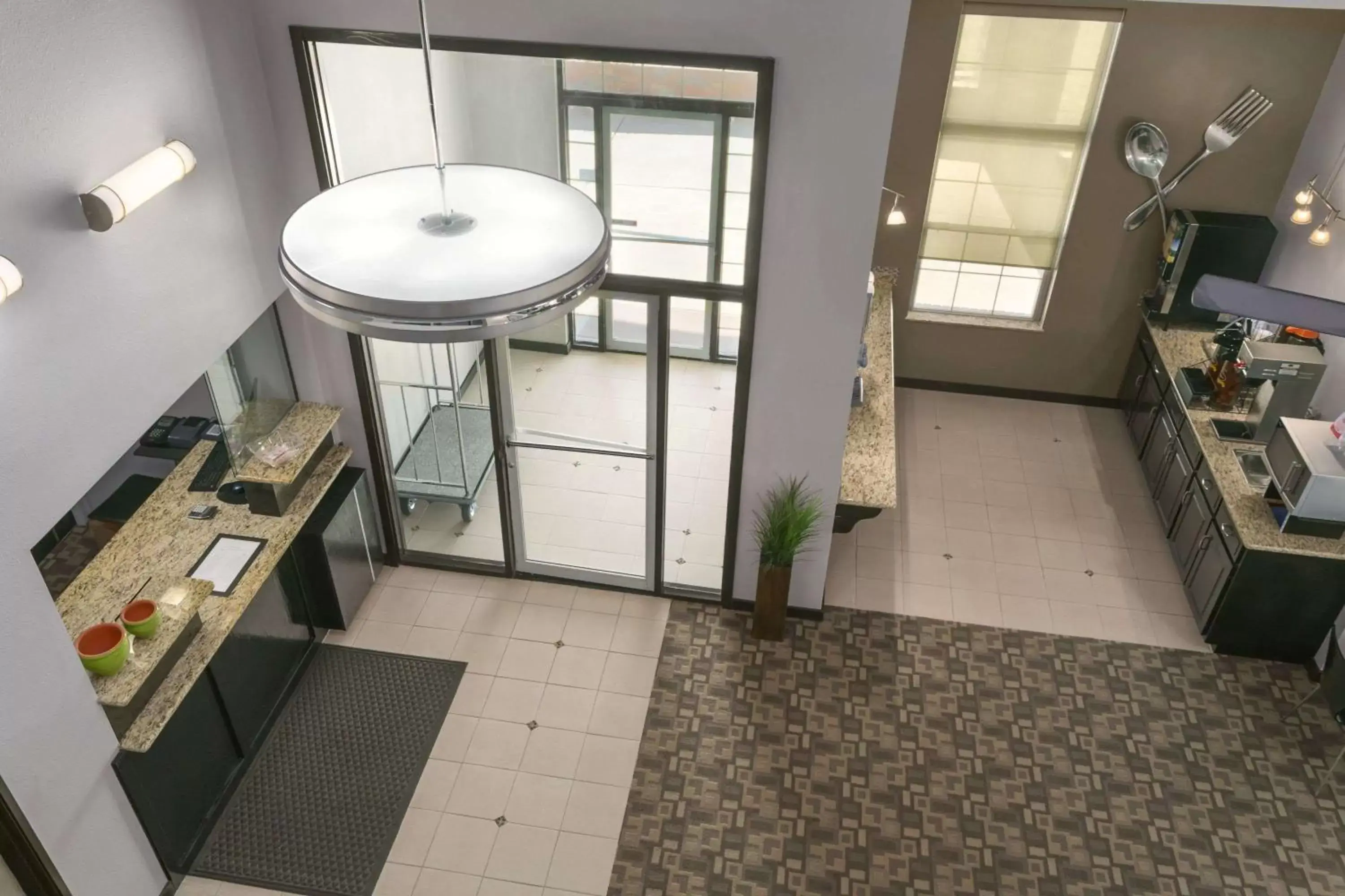 Lobby or reception in Super 8 by Wyndham Stafford/Springfield Area Lobby or reception in Super 8 by Wyndham Stafford/Springfield Area