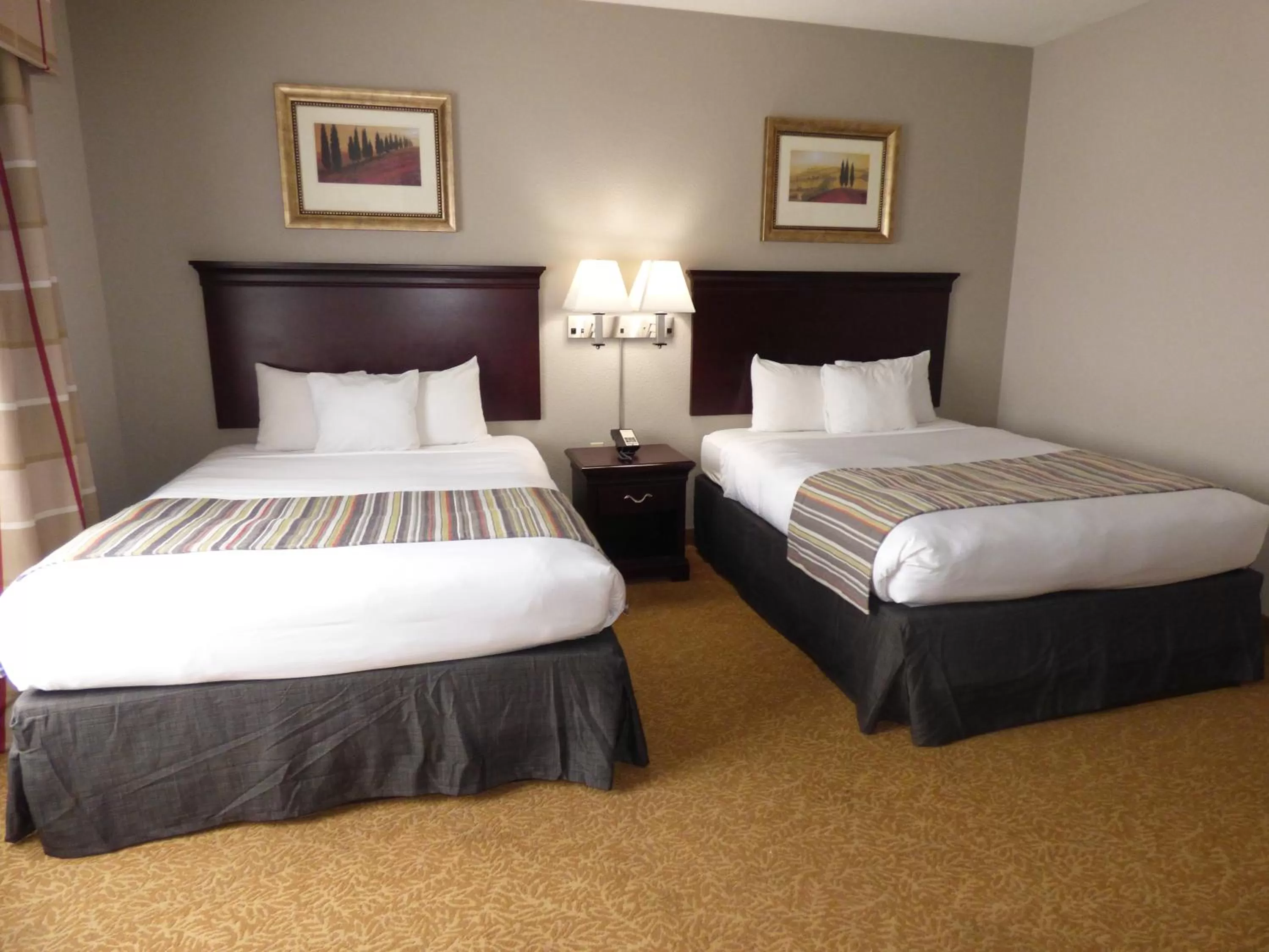Bedroom, Bed in Country Inn & Suites by Radisson, Pensacola West, FL