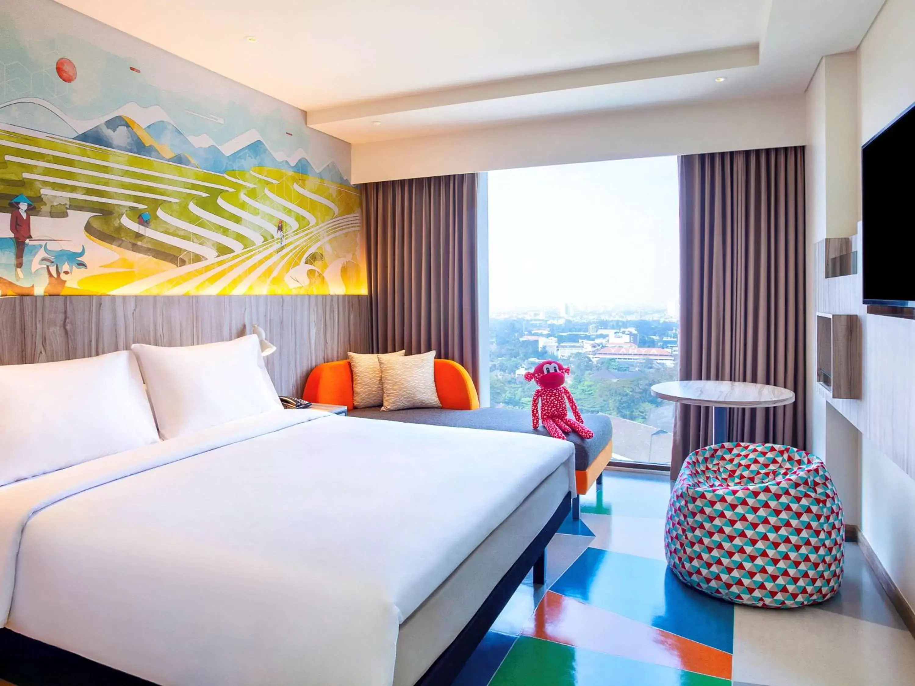Photo of the whole room in ibis Styles Bandung Grand Central