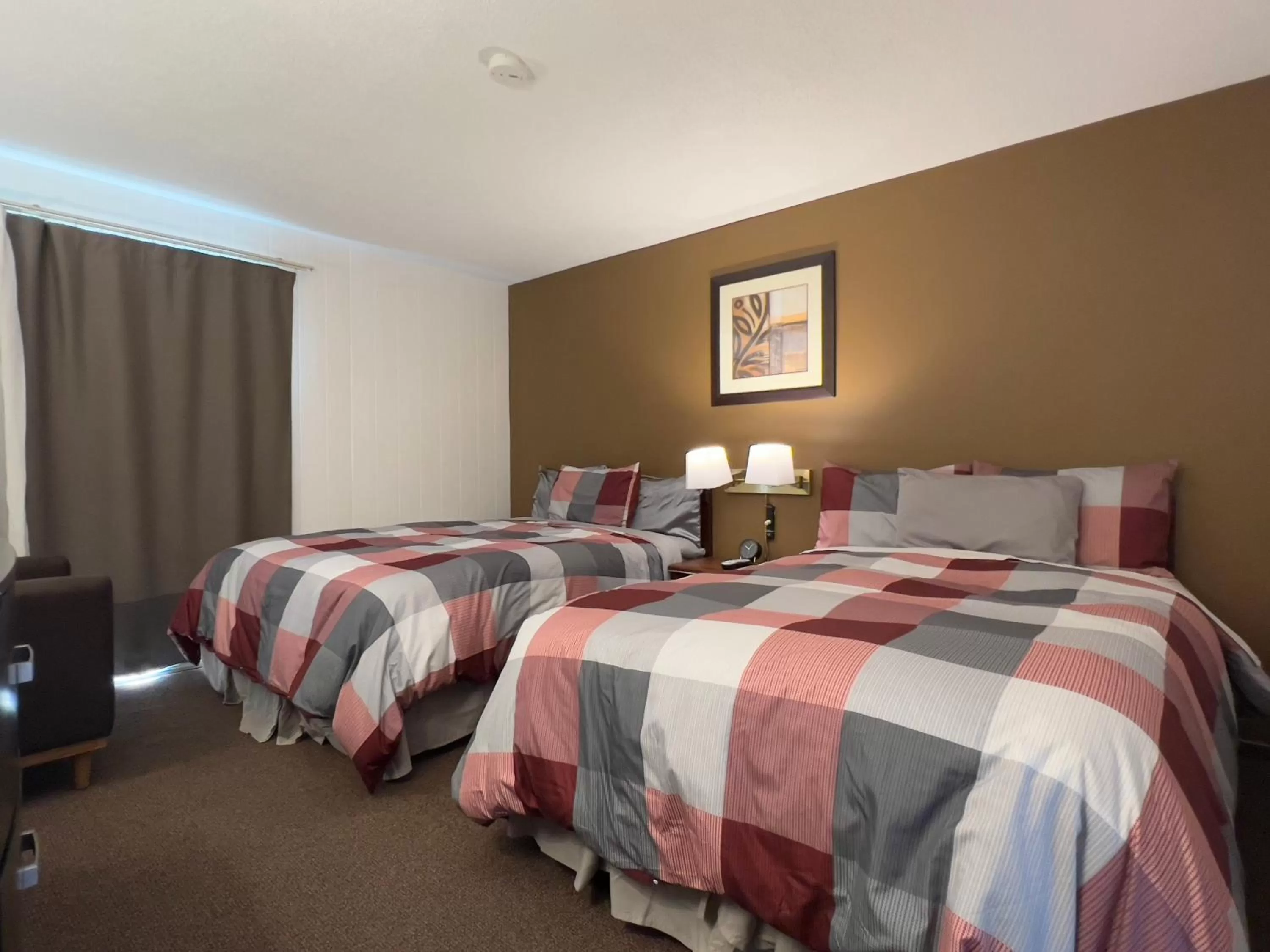 Bed in Monashee Motel