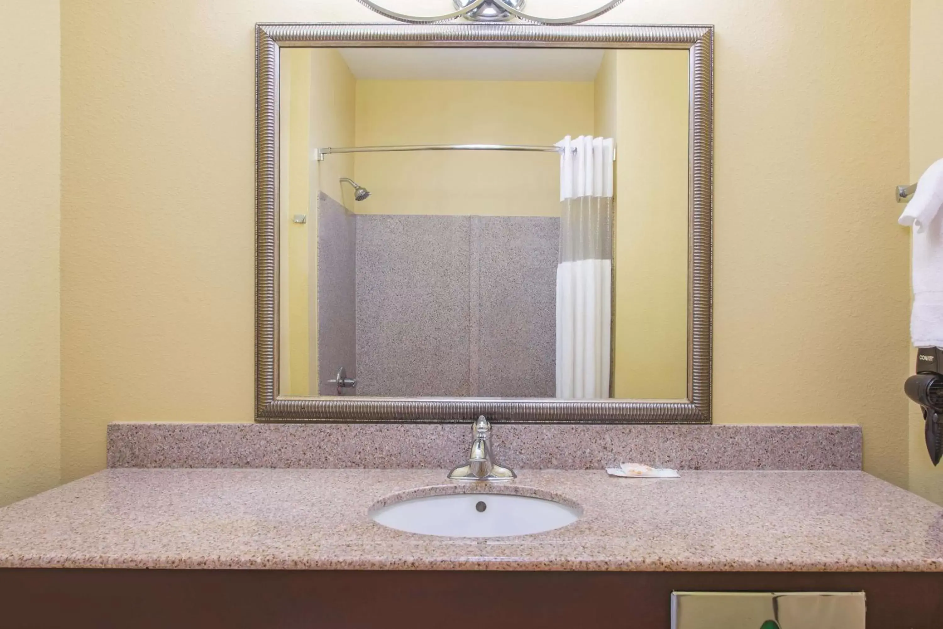 Photo of the whole room, Bathroom in La Quinta by Wyndham Tulsa Airport / Expo Square