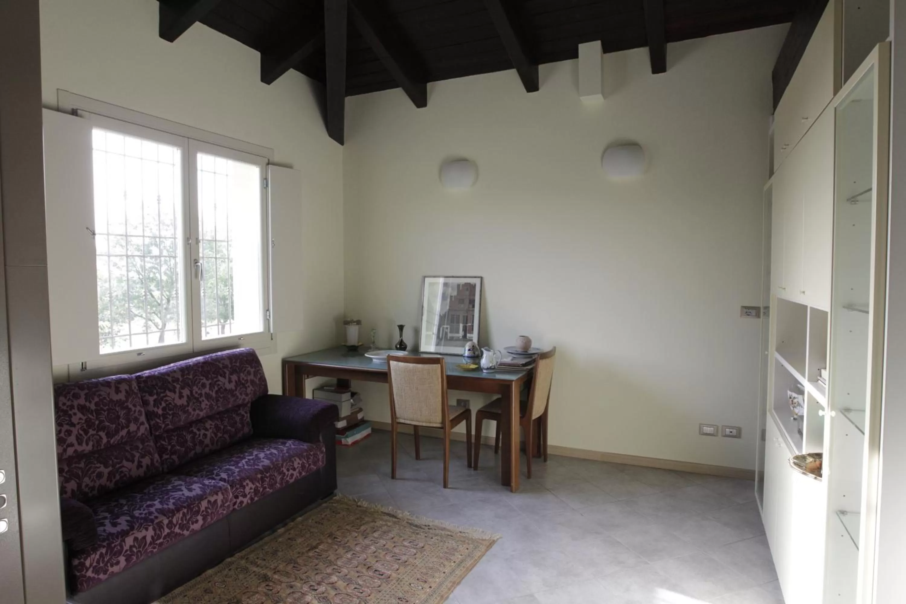 Communal lounge/ TV room in B&B Magic