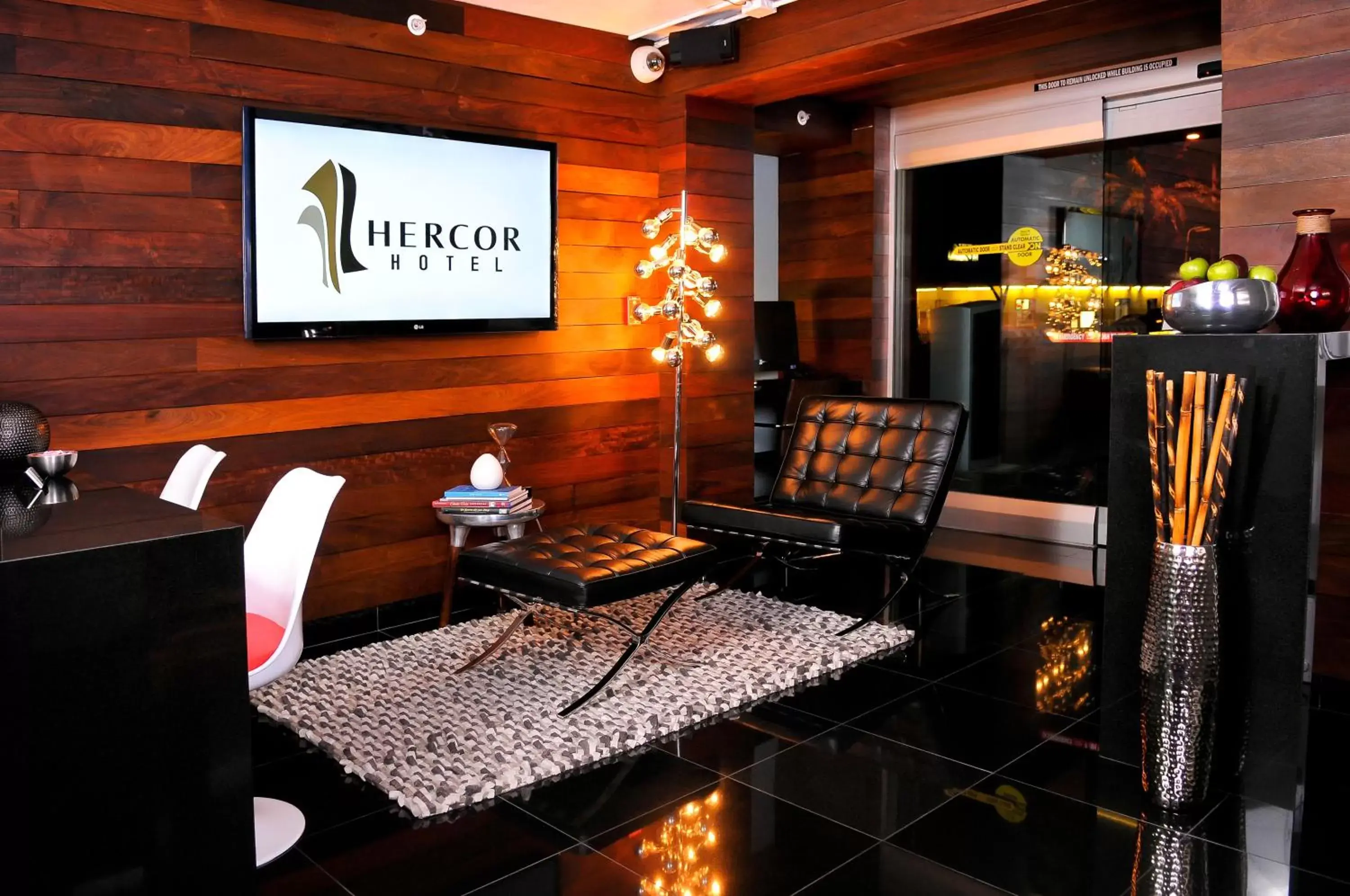 Property logo or sign in Hercor Hotel - Urban Boutique