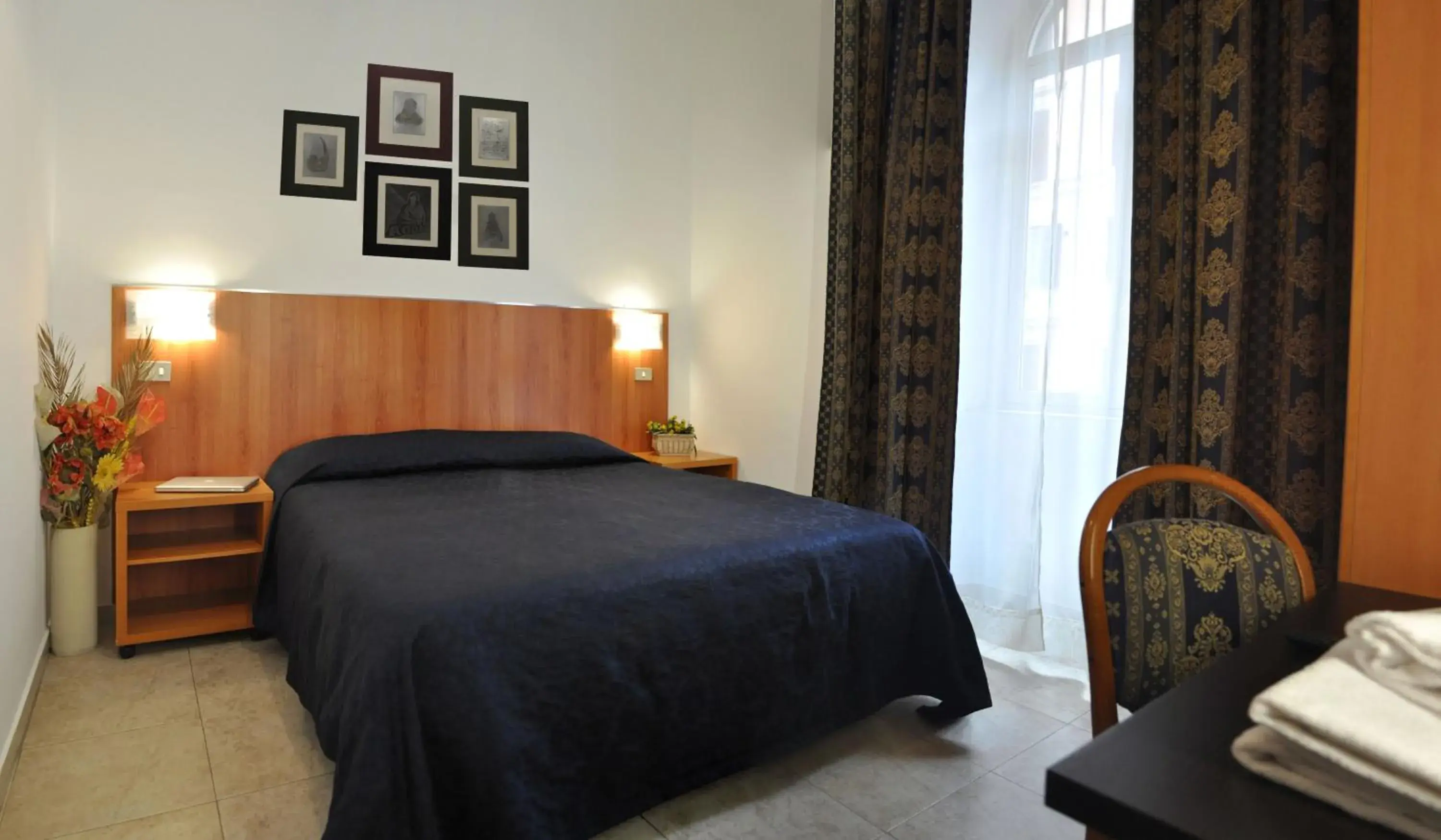 Bed in Hotel Fiorenza