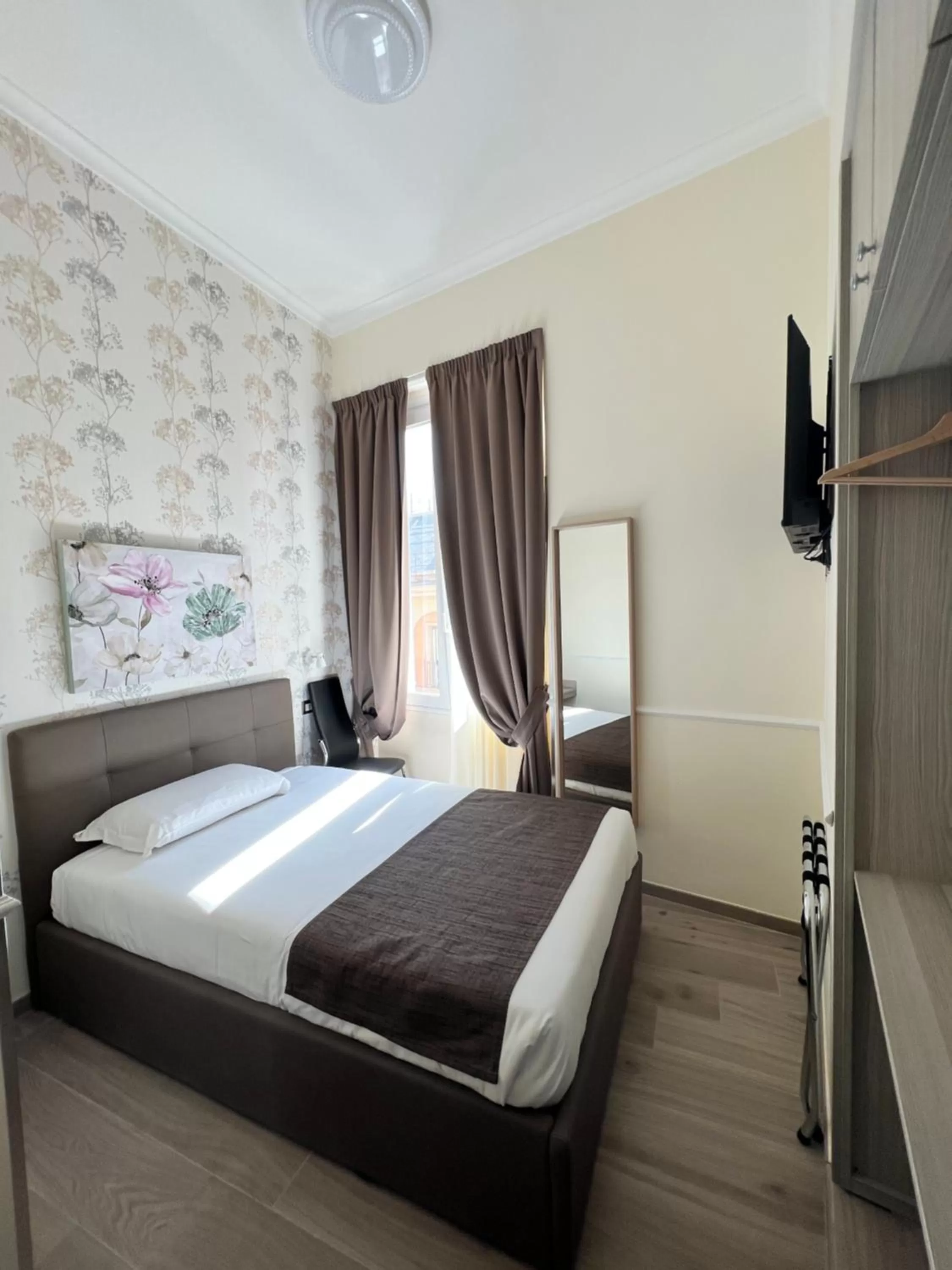 Bed in Hotel Le Petit