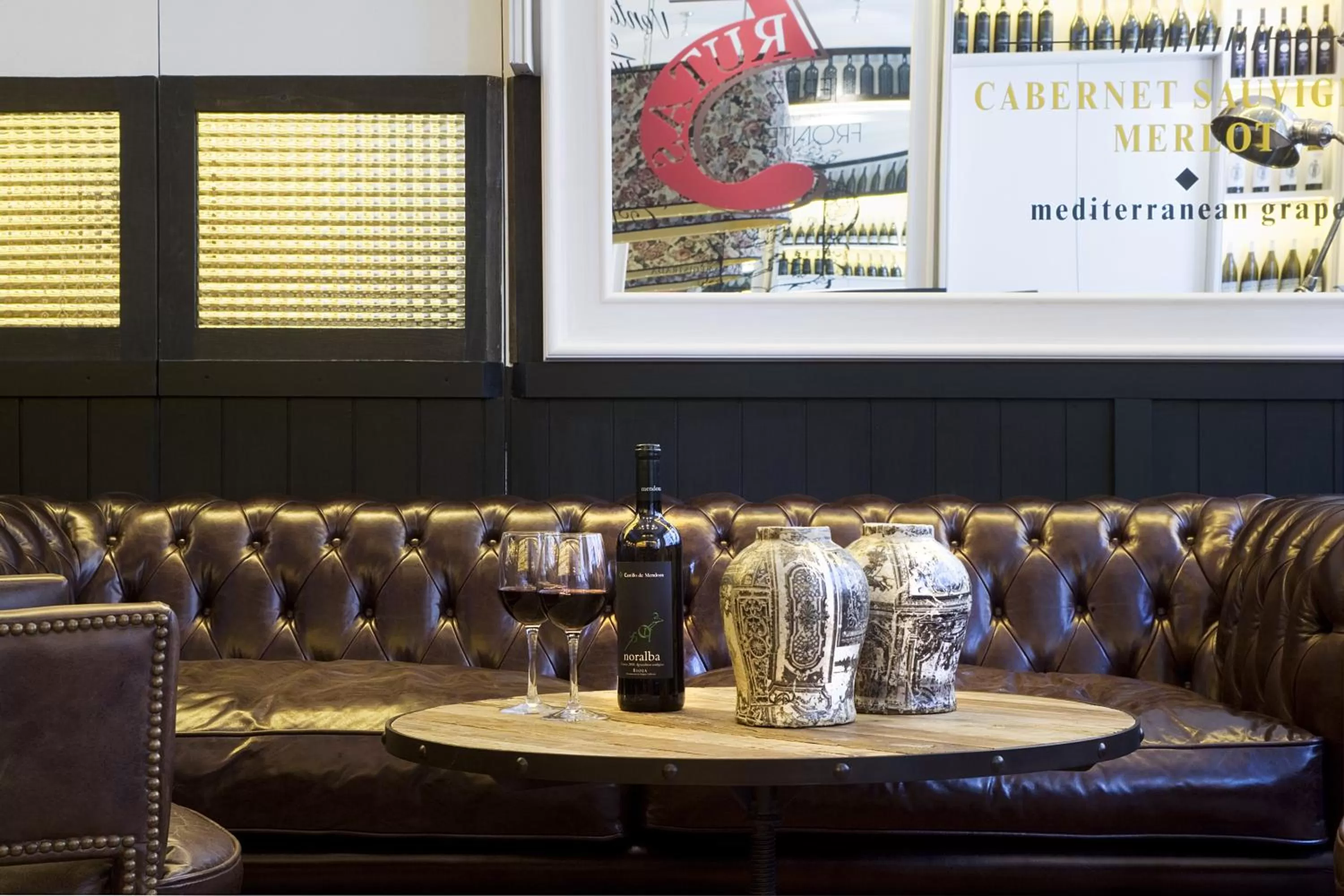 Lounge or bar in Praktik Vinoteca