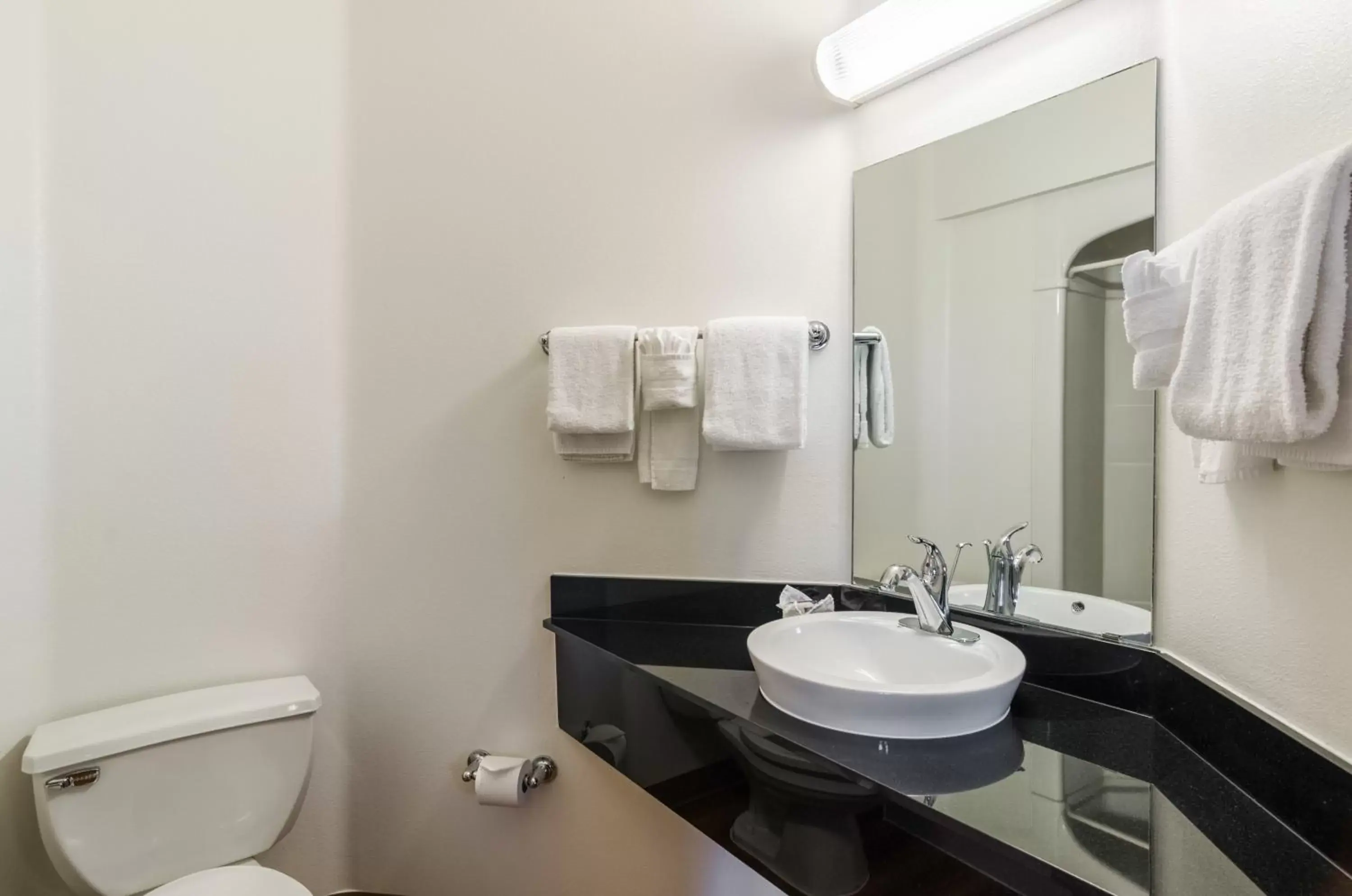 Bathroom in Baymont by Wyndham Sheridan Bathroom in Baymont by Wyndham Sheridan