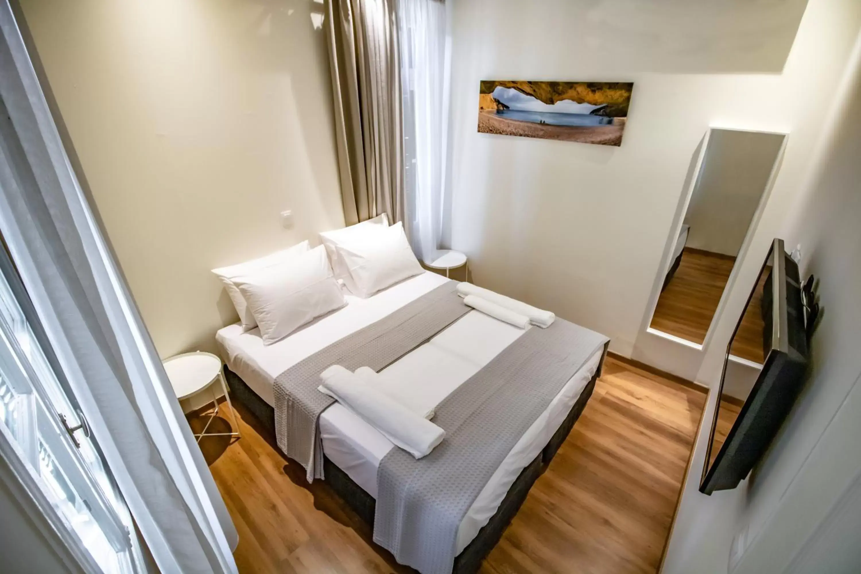 Bed in Levkosh Apartments at Lefkada's Heart