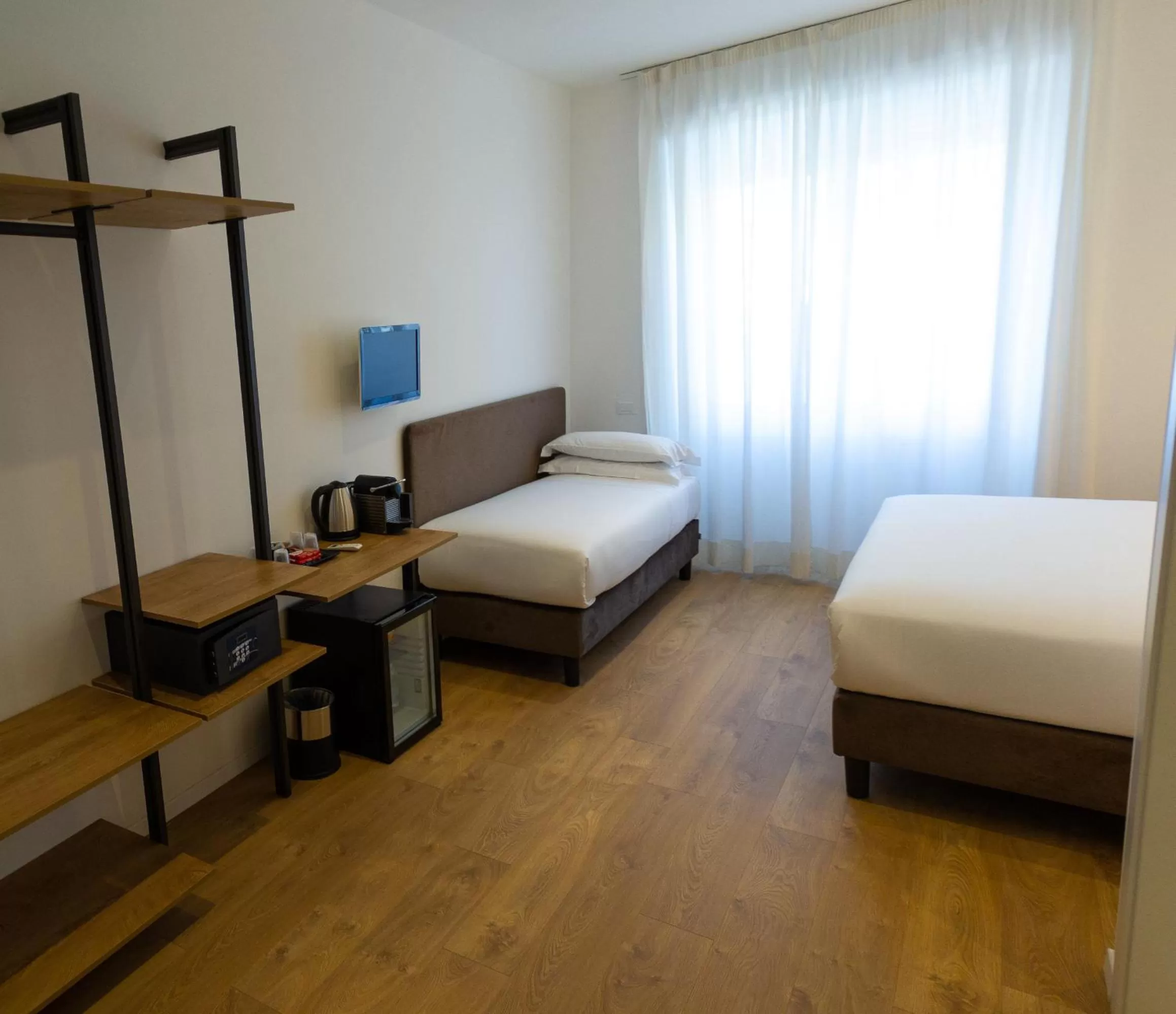 Bed in Michelangelo Vatican Rooms