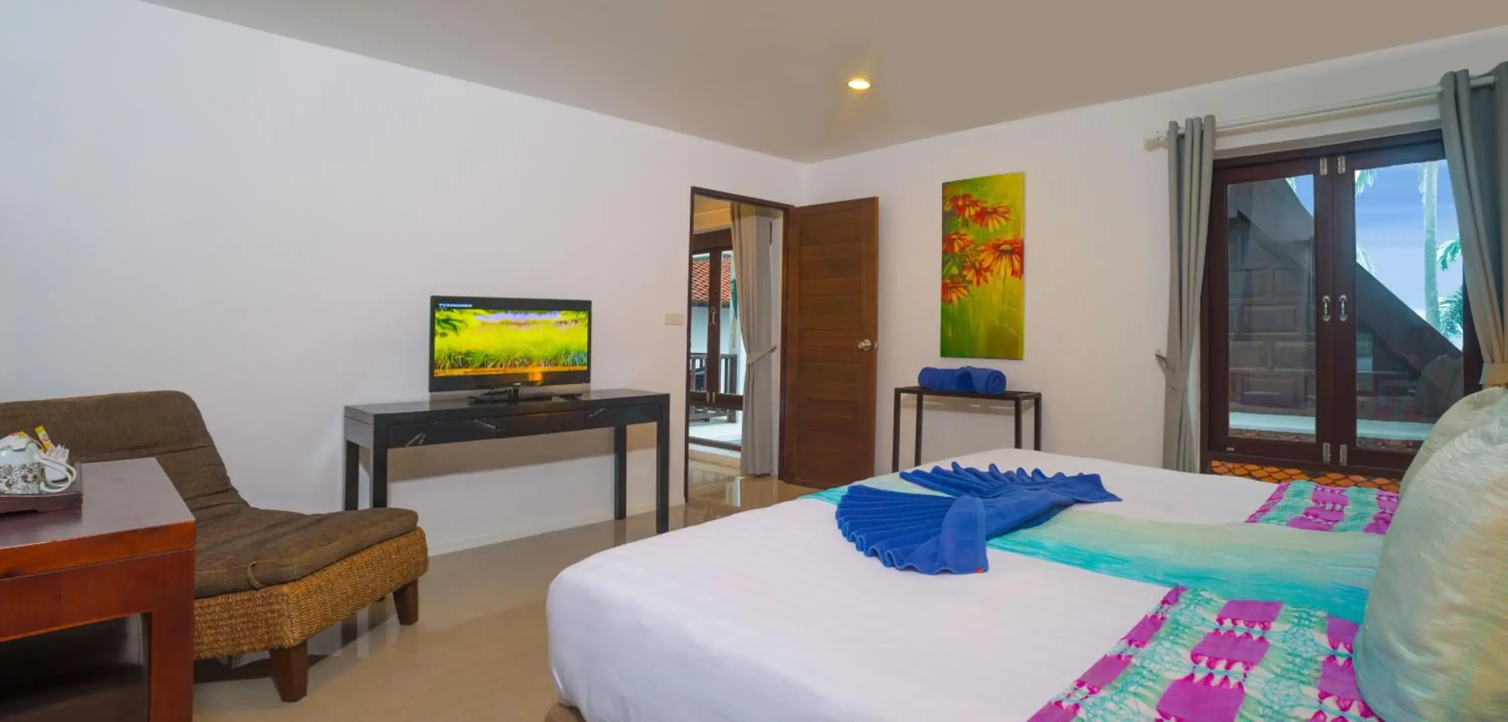 Photo of the whole room, TV/Entertainment Center in Baan Bophut Beach Hotel Samui - SHA Extra Plus