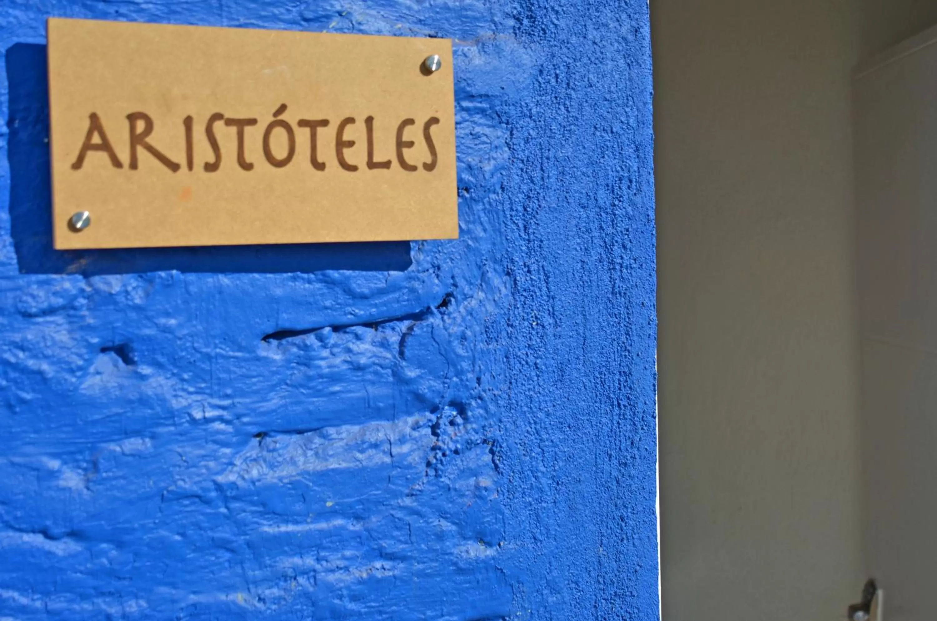 Logo/Certificate/Sign in Faro de Alejandría Hostel