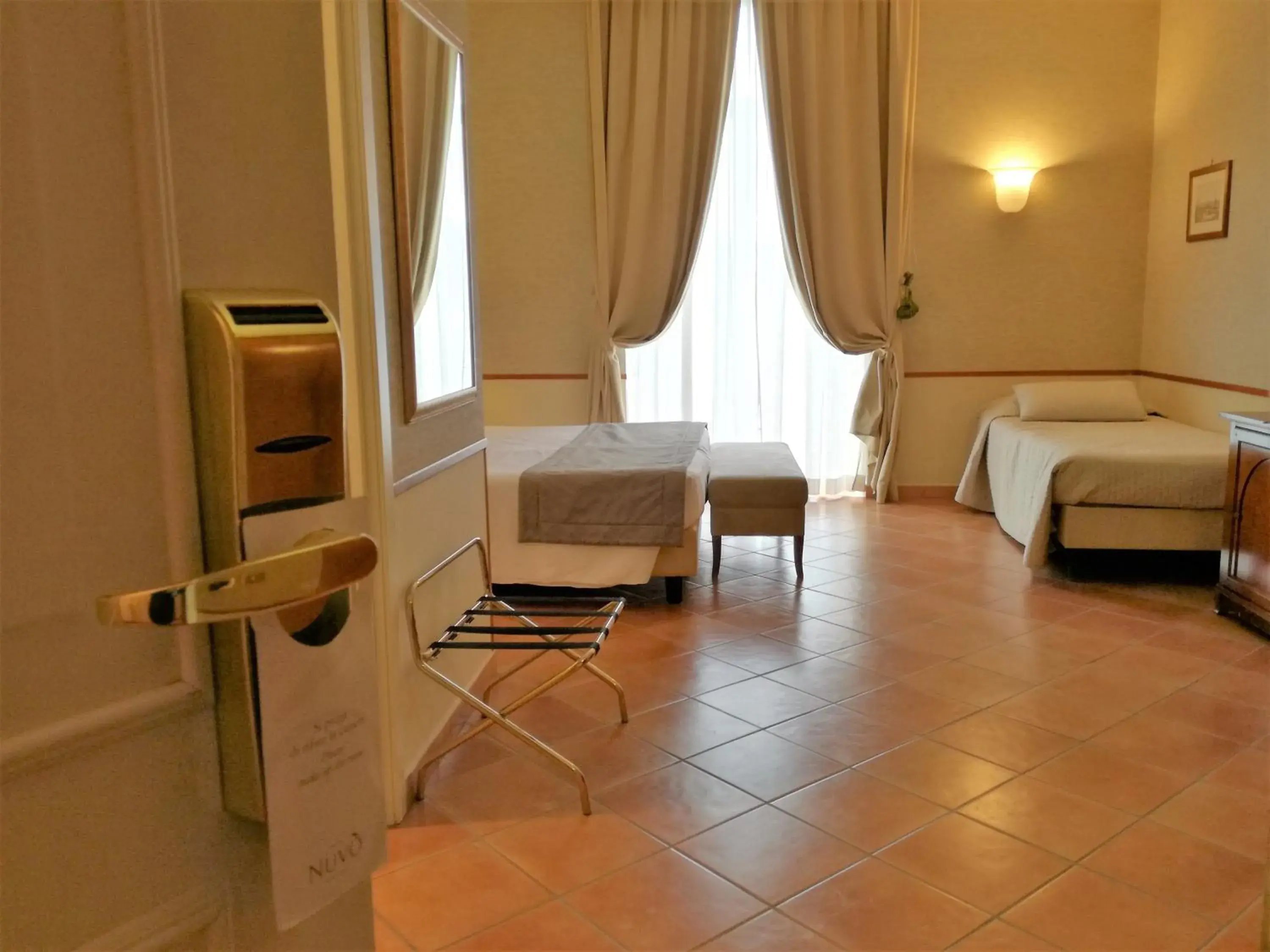 Bedroom, Seating Area in Hotel Nuvò