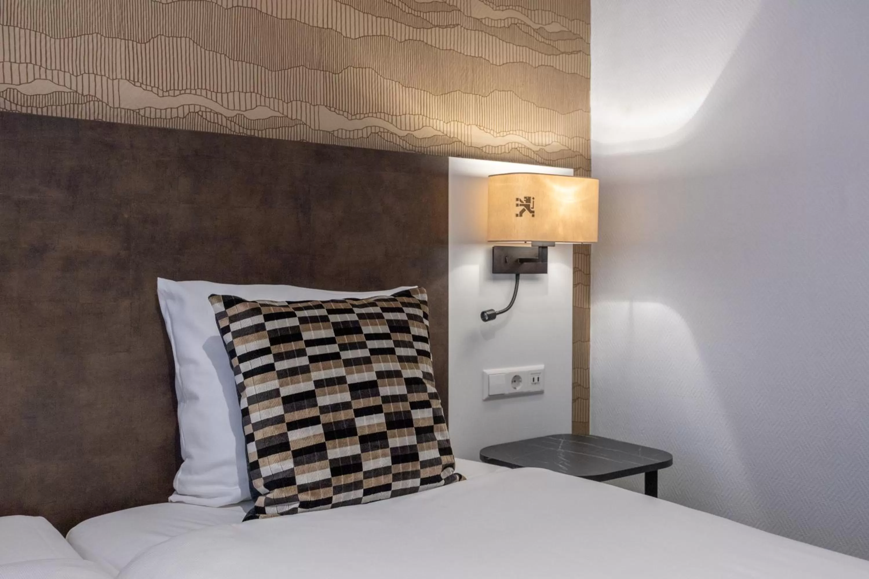 Bed in Hotel Amsterdam De Roode Leeuw