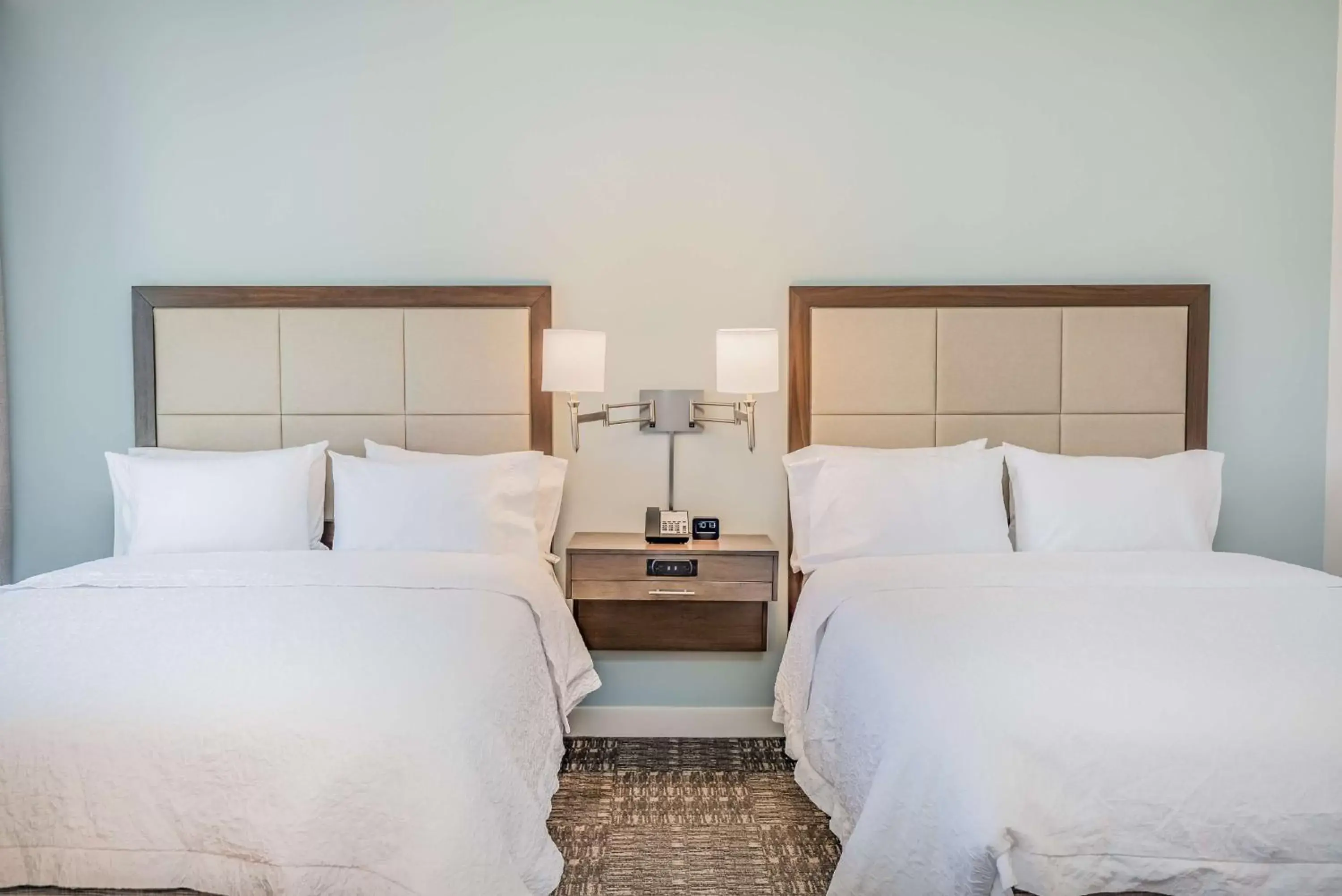 Bed in Hampton Inn & Suites Panama City Beach-Beachfront