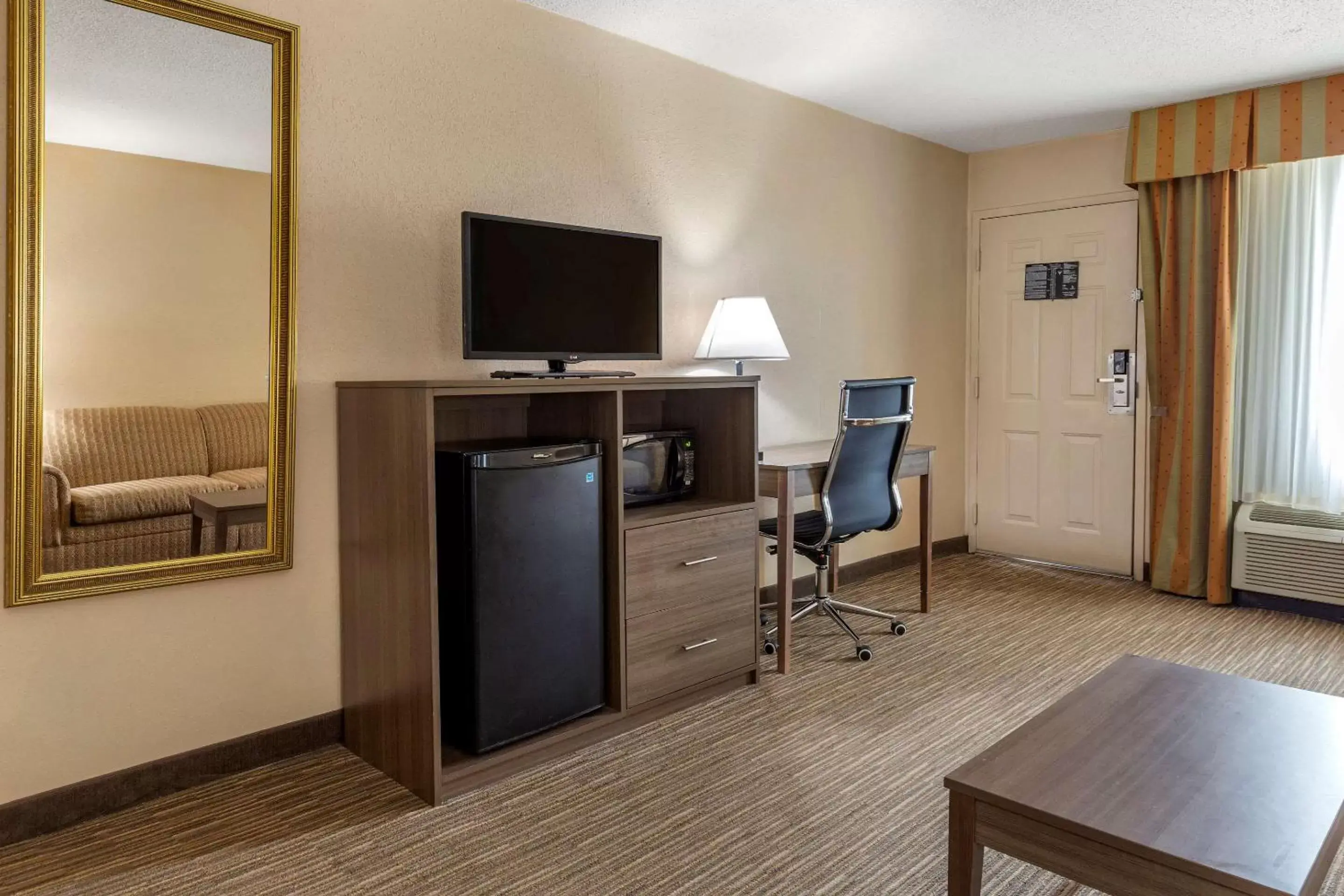 Bedroom, Seating Area in Quality Inn & Suites Hanes Mall